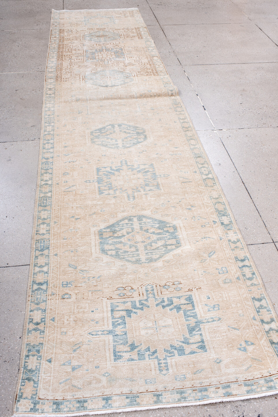 3' x 13' one-of-a-kind handmade antique Karaje runner rug. Color palette: ivory, pale blue, beige, taupe, camel, light brown