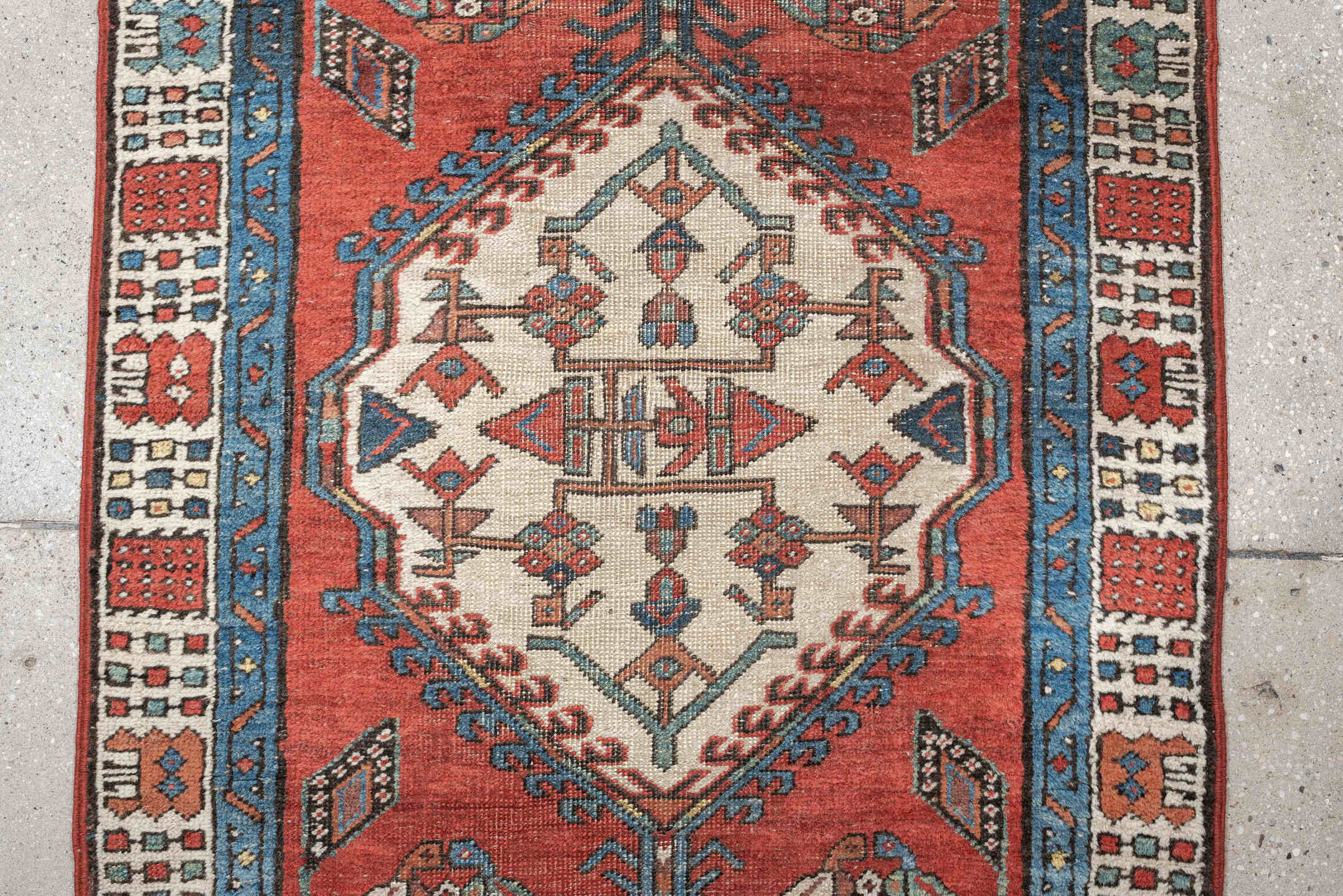 2' x 9' one-of-a-kind handmade vintage Saraband runner rug. Color palette: terra cotta, ivory, blue, rust, slate, sage