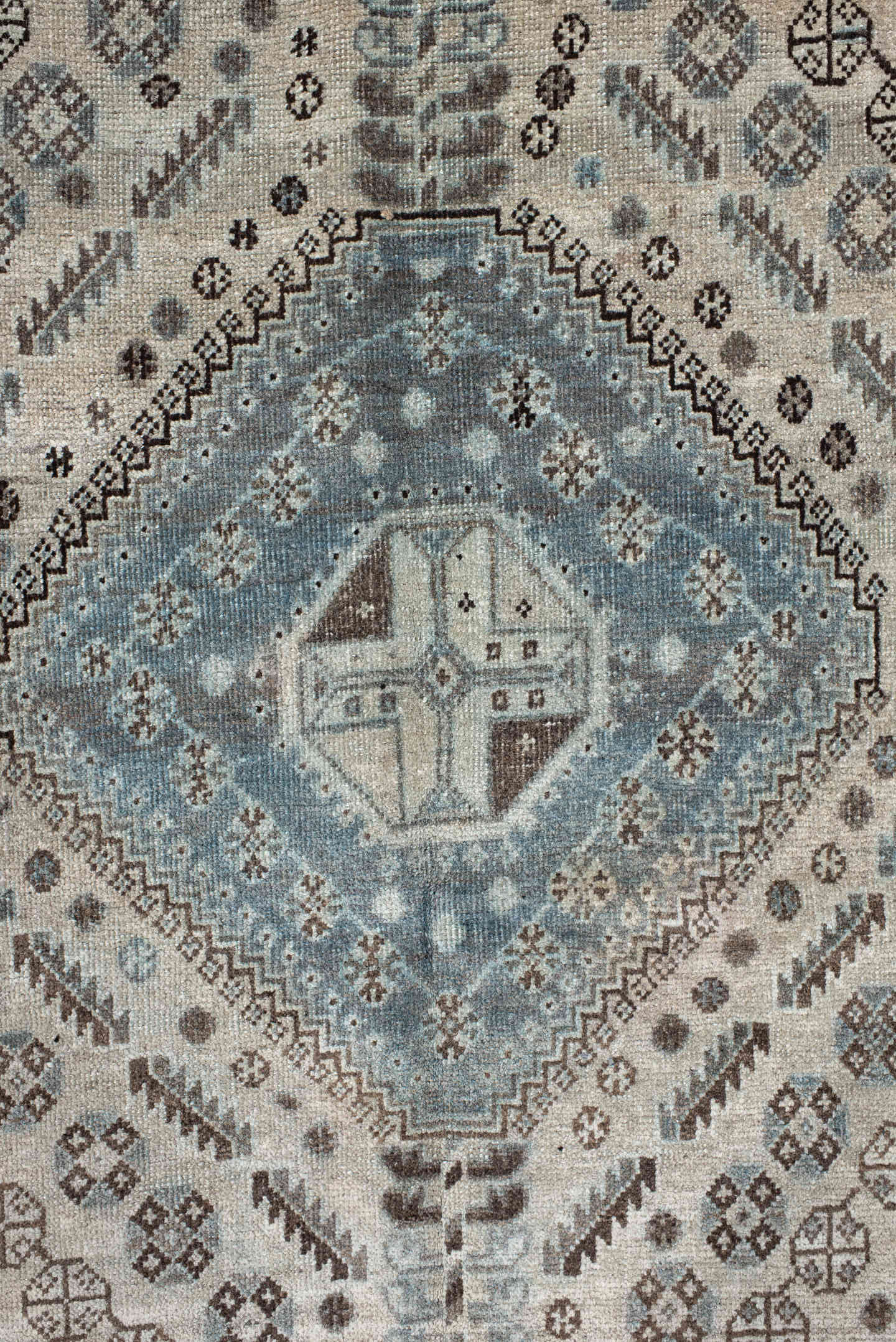 5' x 8' one-of-a-kind handmade antique Shiraz medium size rug. Color palette: ivory, powder blue, brown, charcoal, taupe