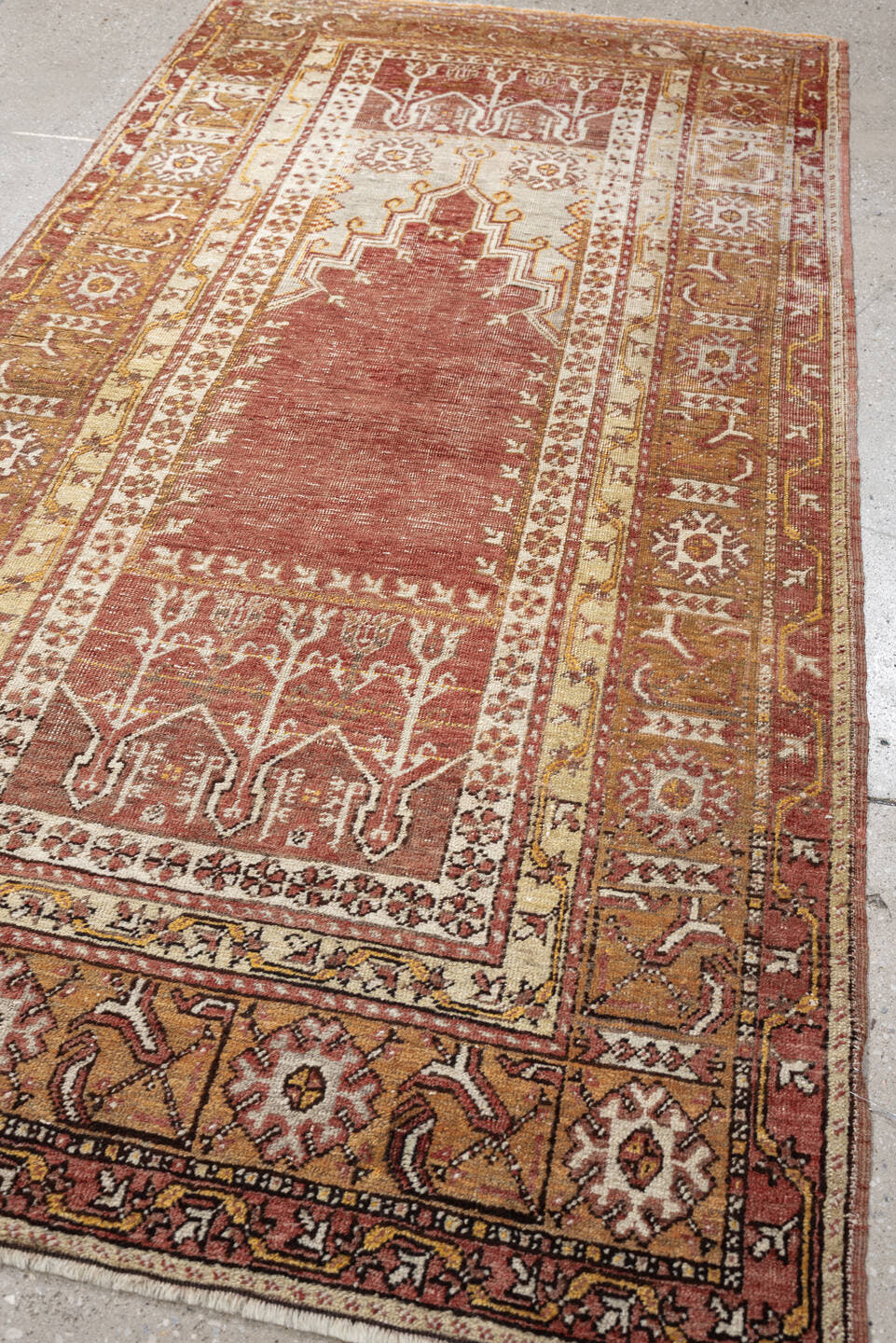 3' x 6' one-of-a-kind handmade antique Anatolian rug. Color palette: terracotta, ivory, ochre, camel, rust, taupe, brown