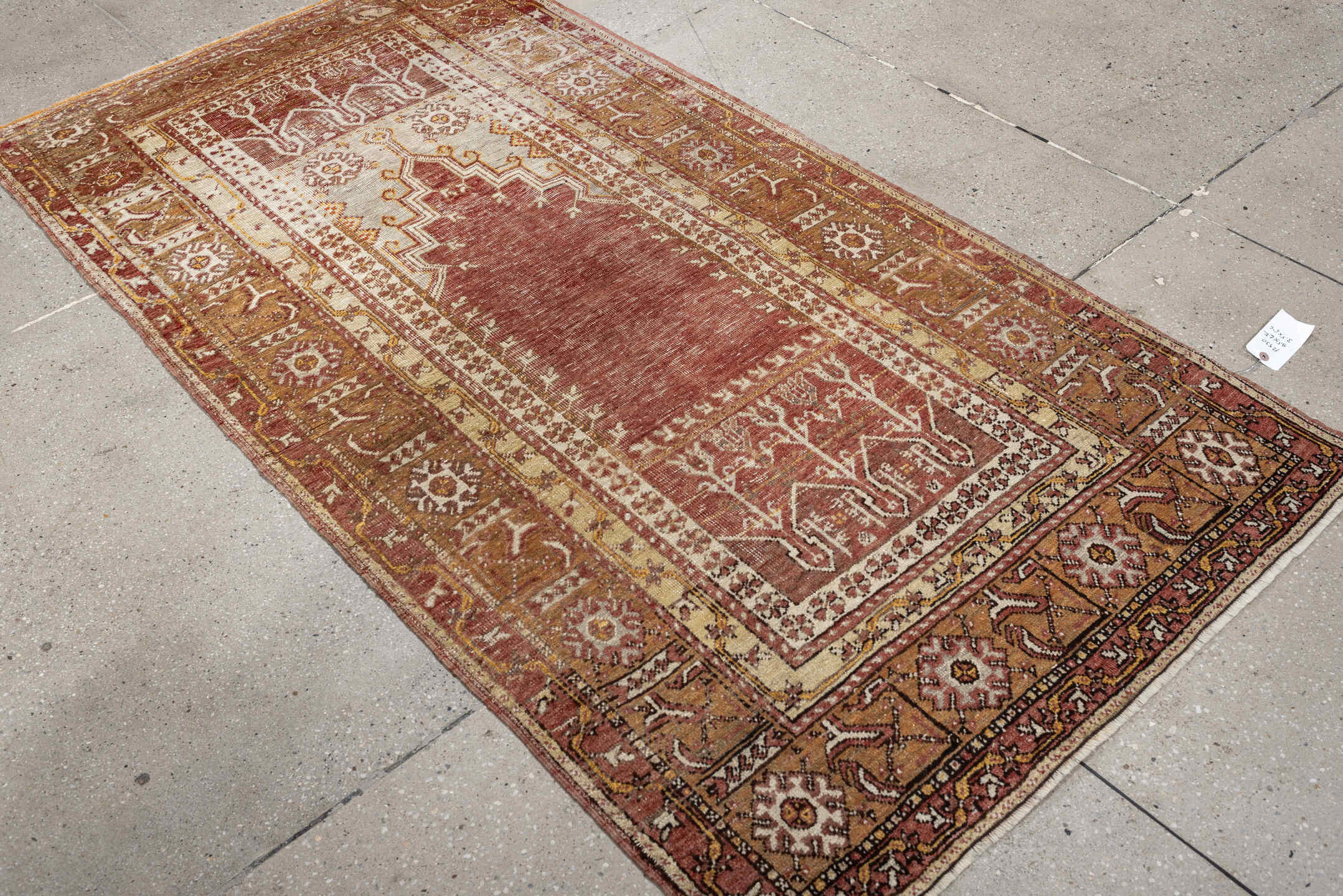 3' x 6' one-of-a-kind handmade antique Anatolian rug. Color palette: terracotta, ivory, ochre, camel, rust, taupe, brown