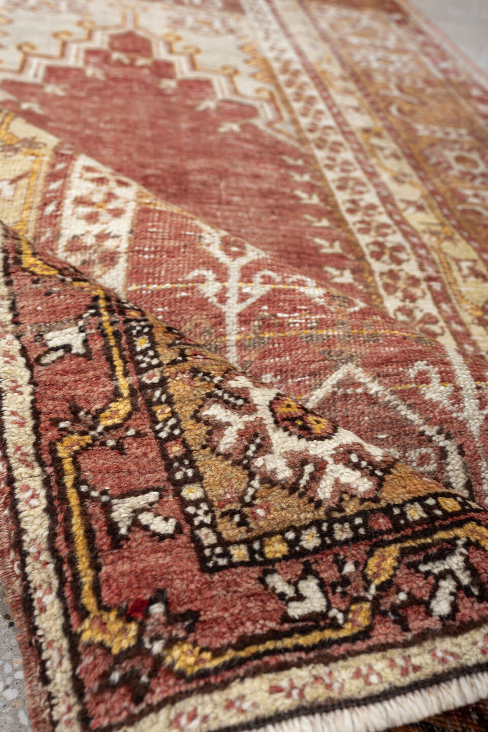 3' x 6' one-of-a-kind handmade antique Anatolian rug. Color palette: terracotta, ivory, ochre, camel, rust, taupe, brown