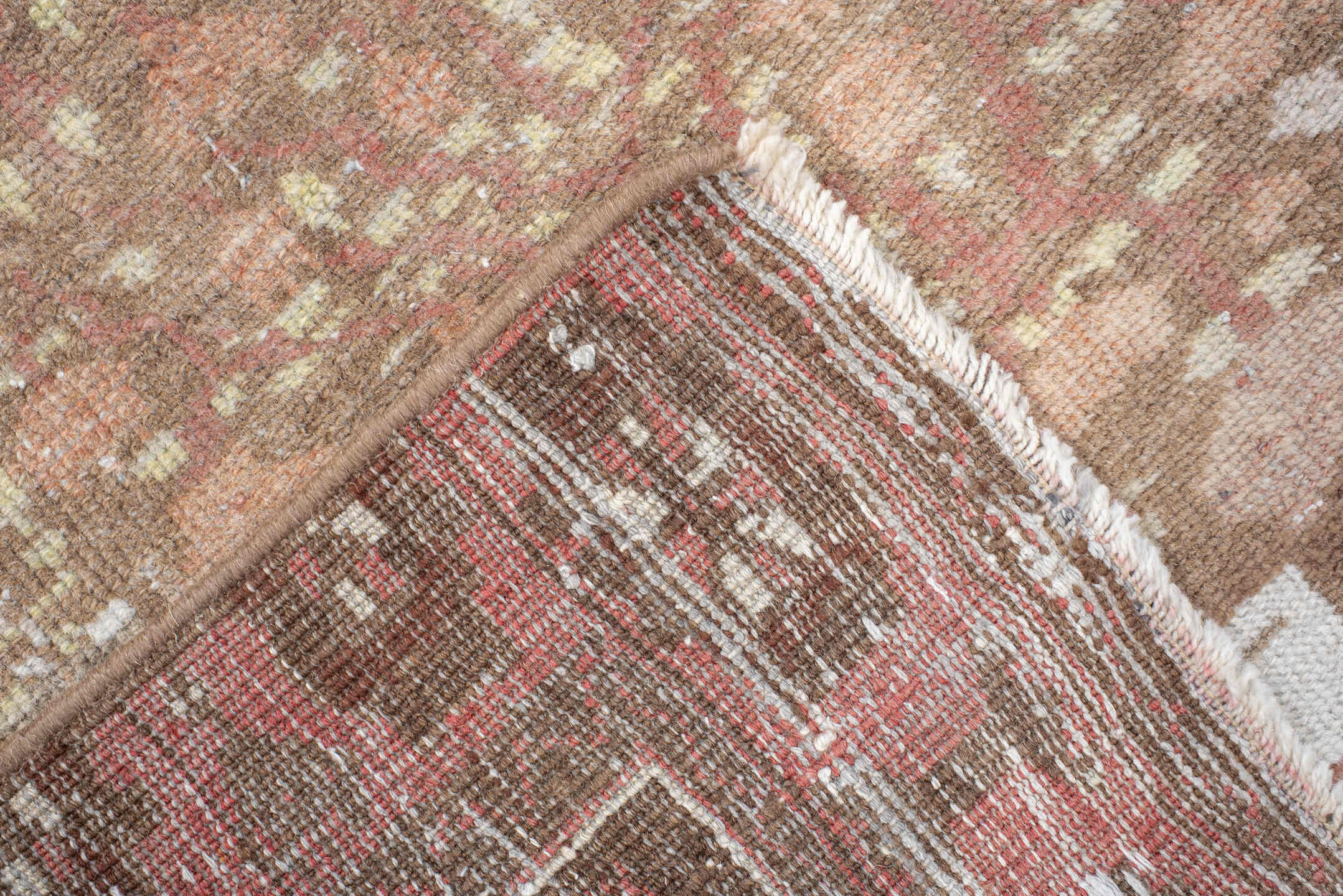 2' x 5' one-of-a-kind handmade vintage Belouch small size rug. Color palette: taupe, ivory, rose, camel, sage, rust, beige