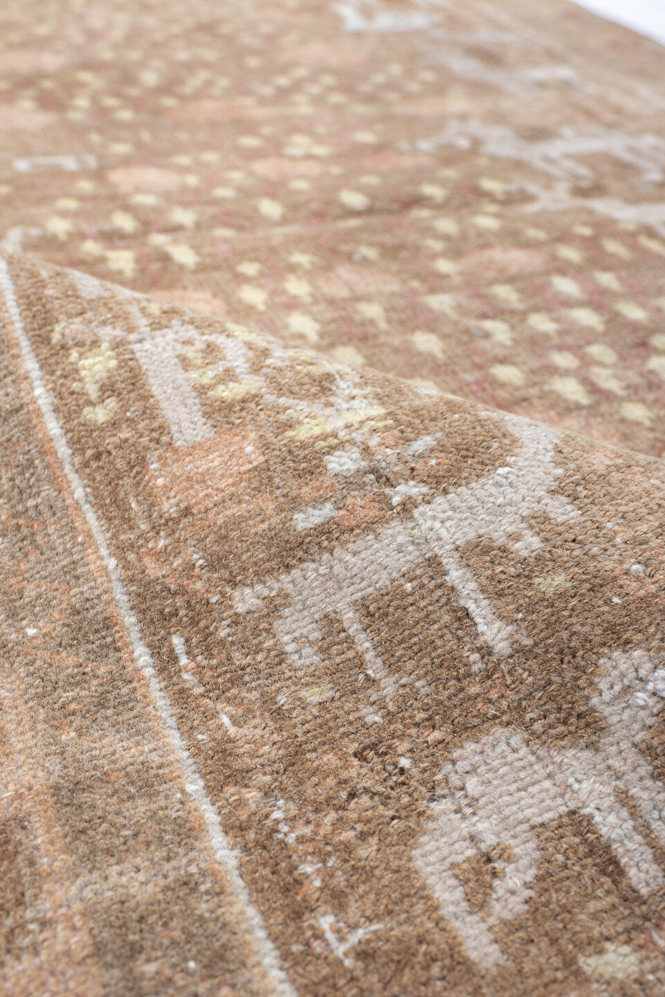 2' x 5' one-of-a-kind handmade vintage Belouch small size rug. Color palette: taupe, ivory, rose, camel, sage, rust, beige