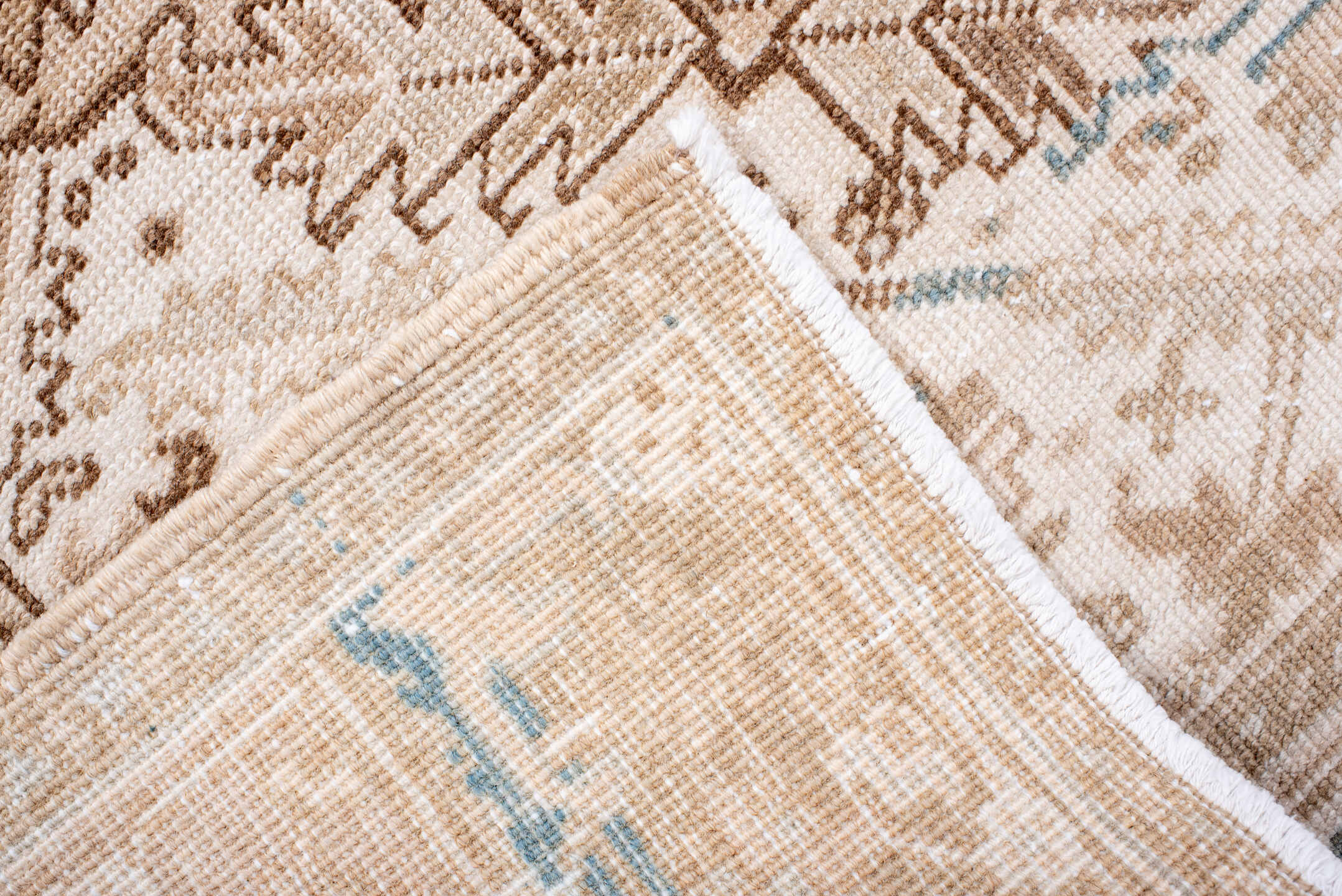 4' x 7' one-of-a-kind handmade antique Heriz rug. Color palette: ivory, blush, camel, taupe, beige, brown, pale blue, pink