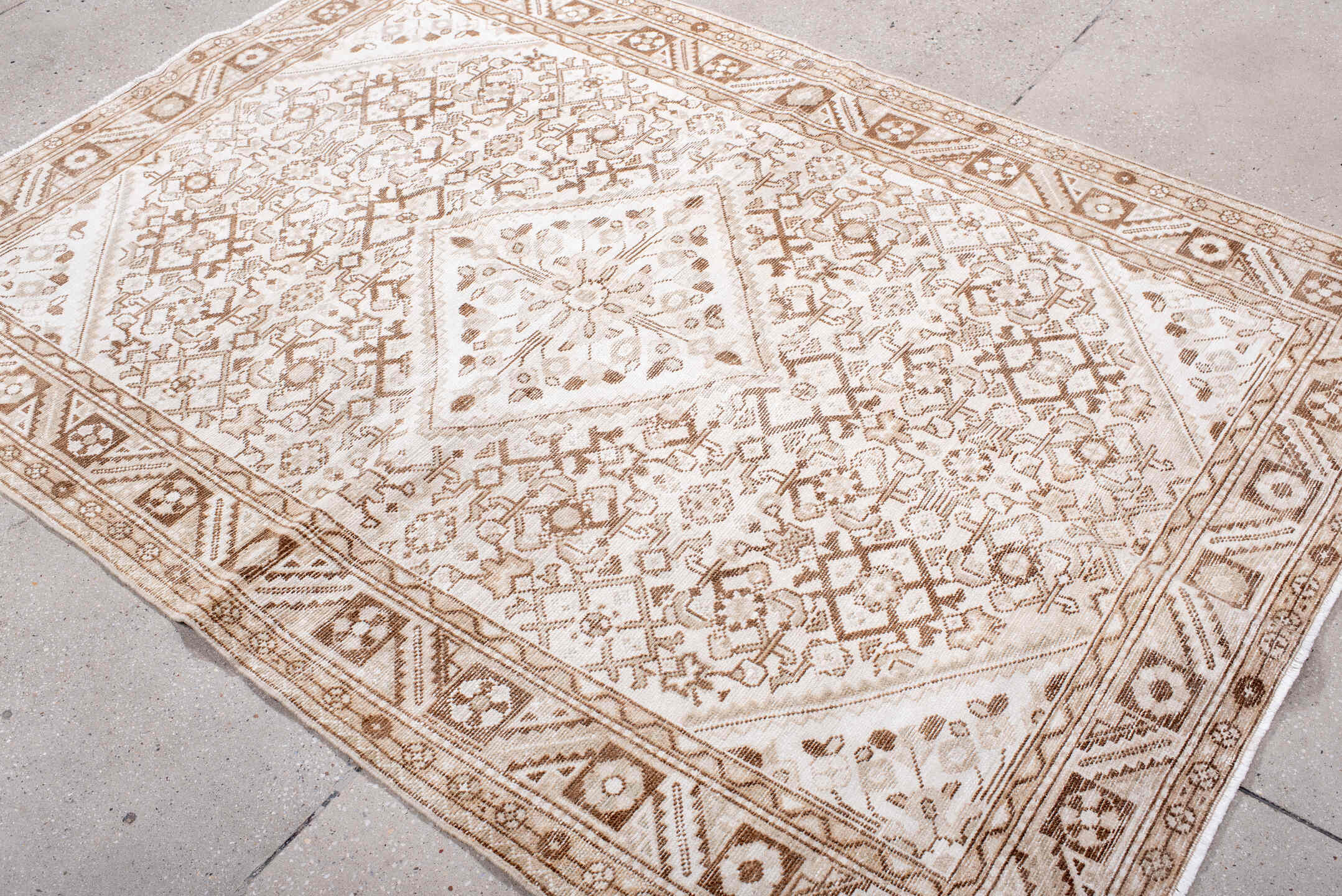 5' x 7' one-of-a-kind handmade antique Hamadan rug. Color palette: ivory, camel, taupe, sand, beige, light brown, gray