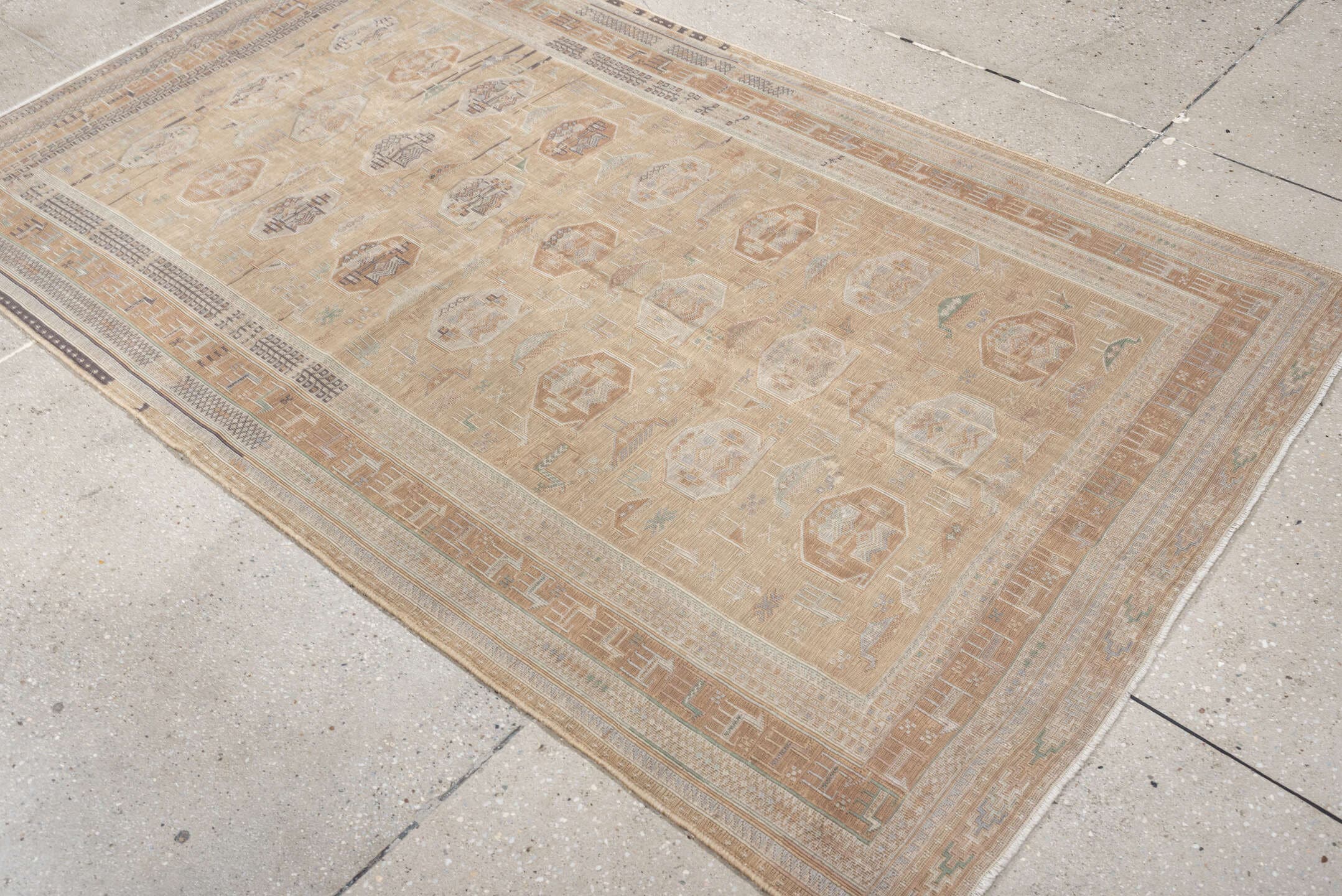 3' x 6' one-of-a-kind handmade antique Sumak small size rug. Color palette: camel, ivory, taupe, dusty rose, blue green