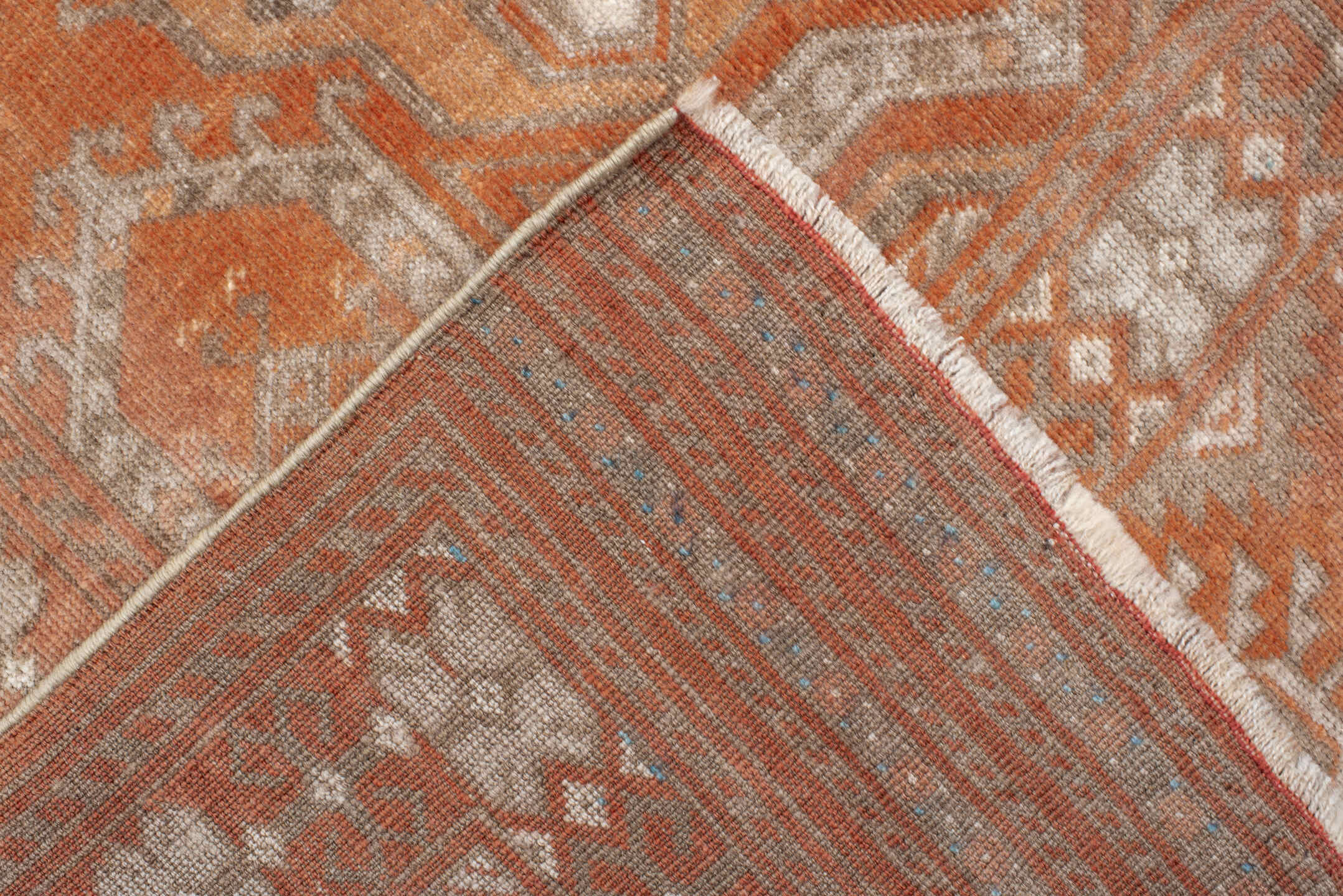 5' x 8' one-of-a-kind handmade vintage Bokara medium size rug. Color palette: brown, gray, light gray, off-white, orange