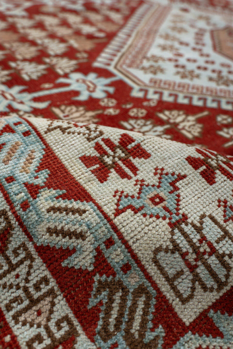 6' x 9' one-of-a-kind handmade antique Shiraz medium size rug. Color palette: rust, ivory, terra cotta, camel, light blue