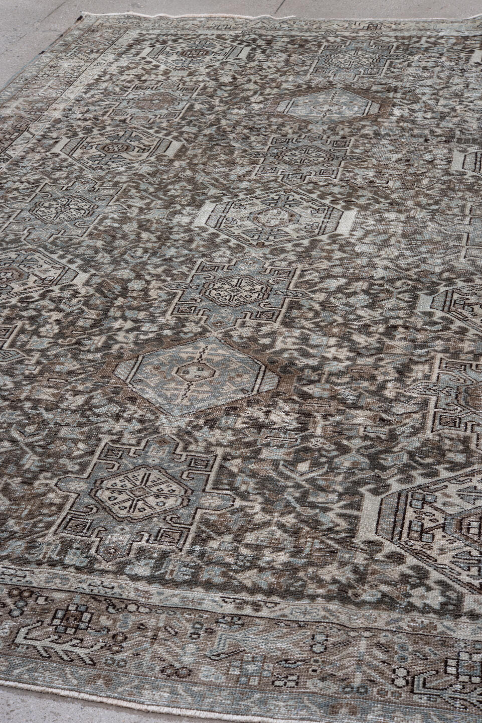 8' x 11' one-of-a-kind handmade vintage Karaje large size rug. Color palette: taupe, ivory, brown, pale blue, charcoal