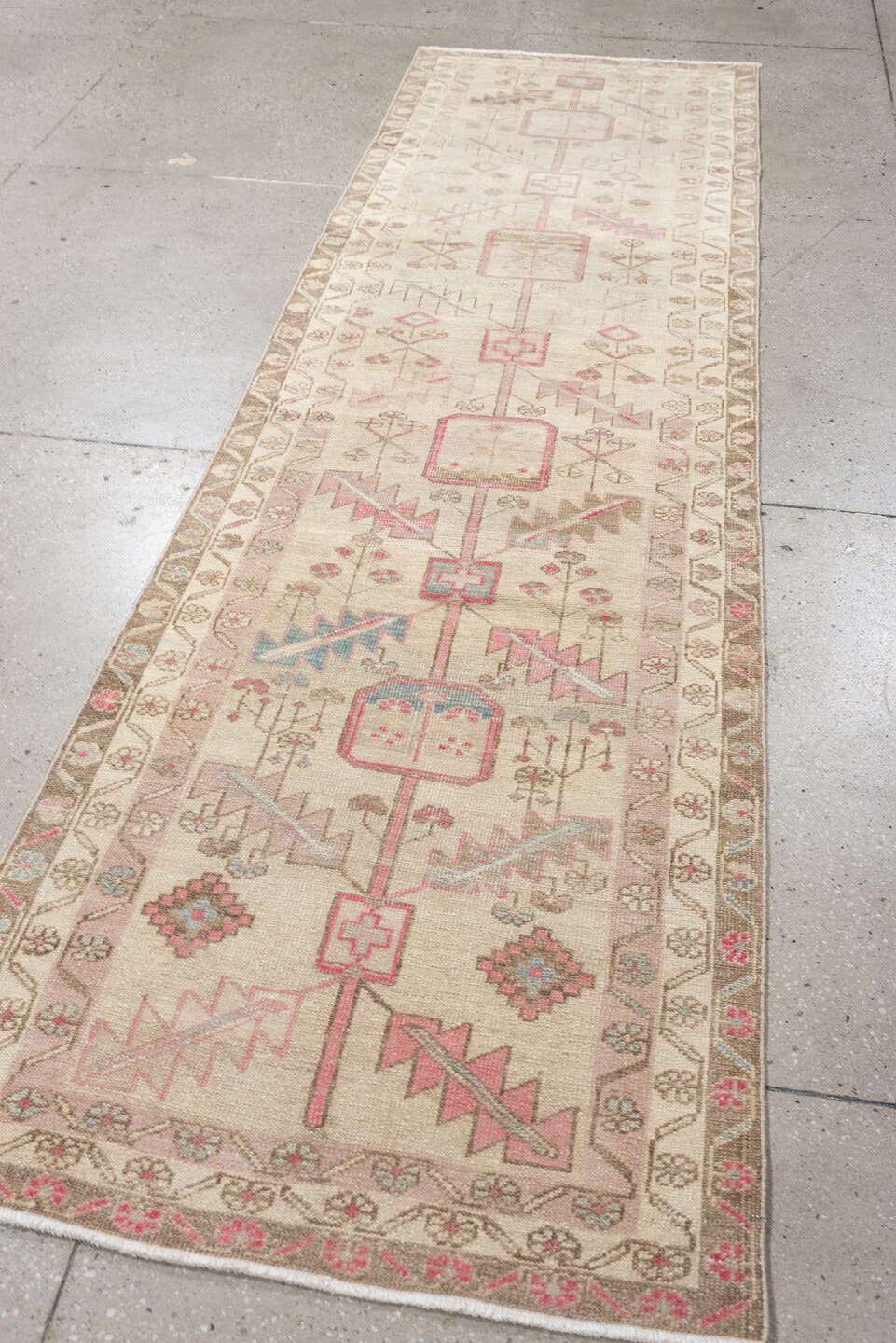 2' x 9' one-of-a-kind handmade vintage Saraband runner rug. Color palette: ivory, taupe, blush, sand, pale blue, beige, gray
