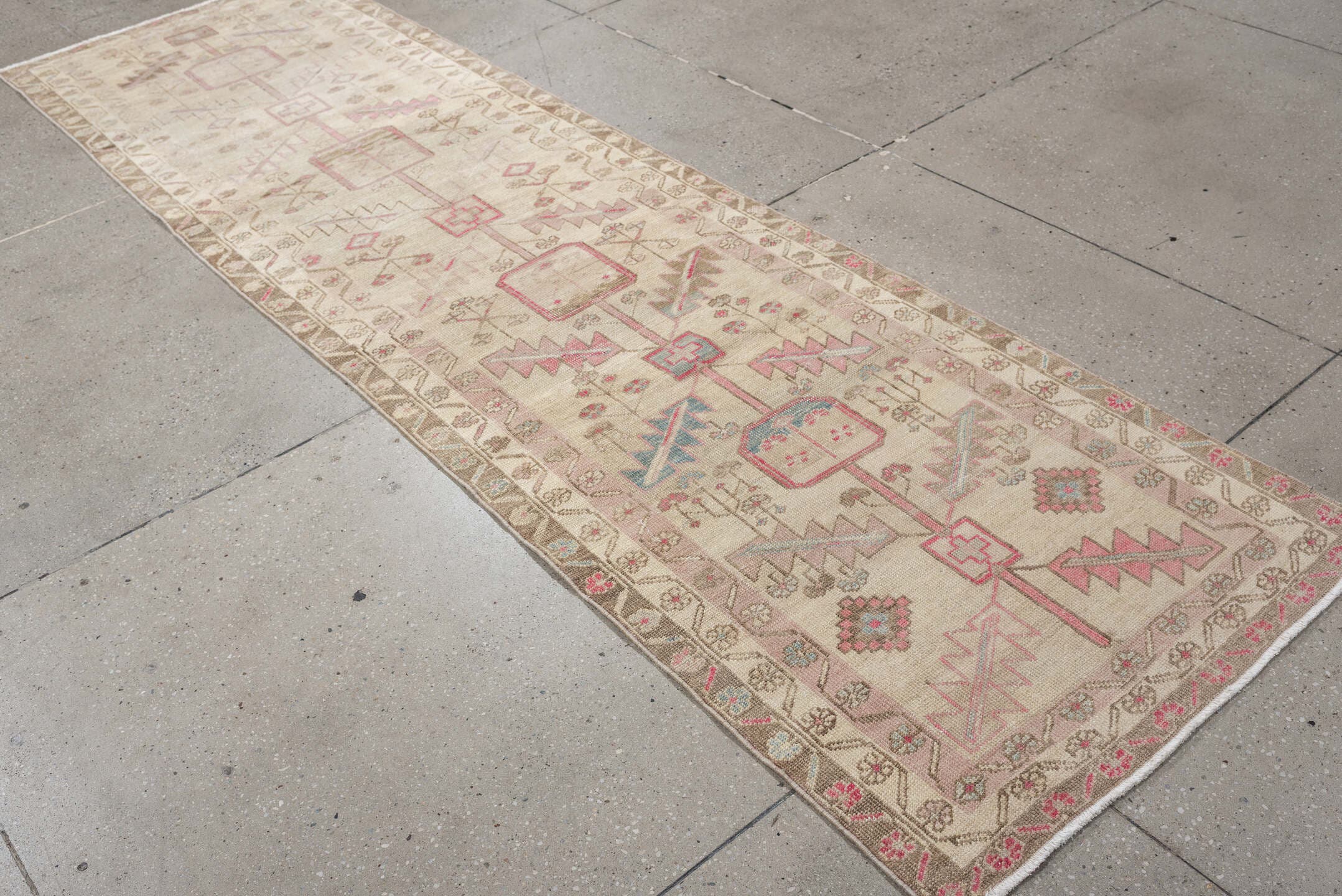 2' x 9' one-of-a-kind handmade vintage Saraband runner rug. Color palette: ivory, taupe, blush, sand, pale blue, beige, gray