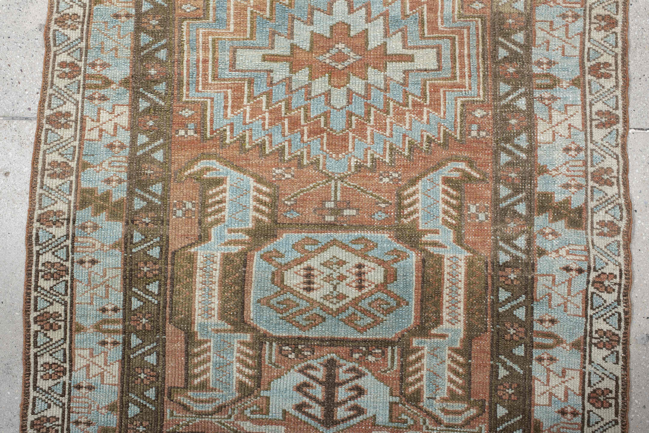 3' x 9' one-of-a-kind handmade antique Heriz runner rug. Color palette: terra cotta, sky blue, ivory, taupe, charcoal, sage