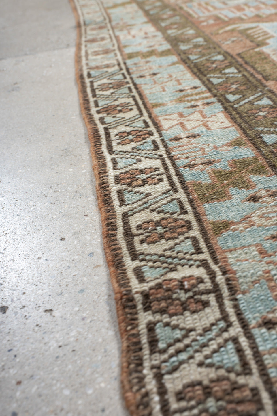 3' x 9' one-of-a-kind handmade antique Heriz runner rug. Color palette: terra cotta, sky blue, ivory, taupe, charcoal, sage
