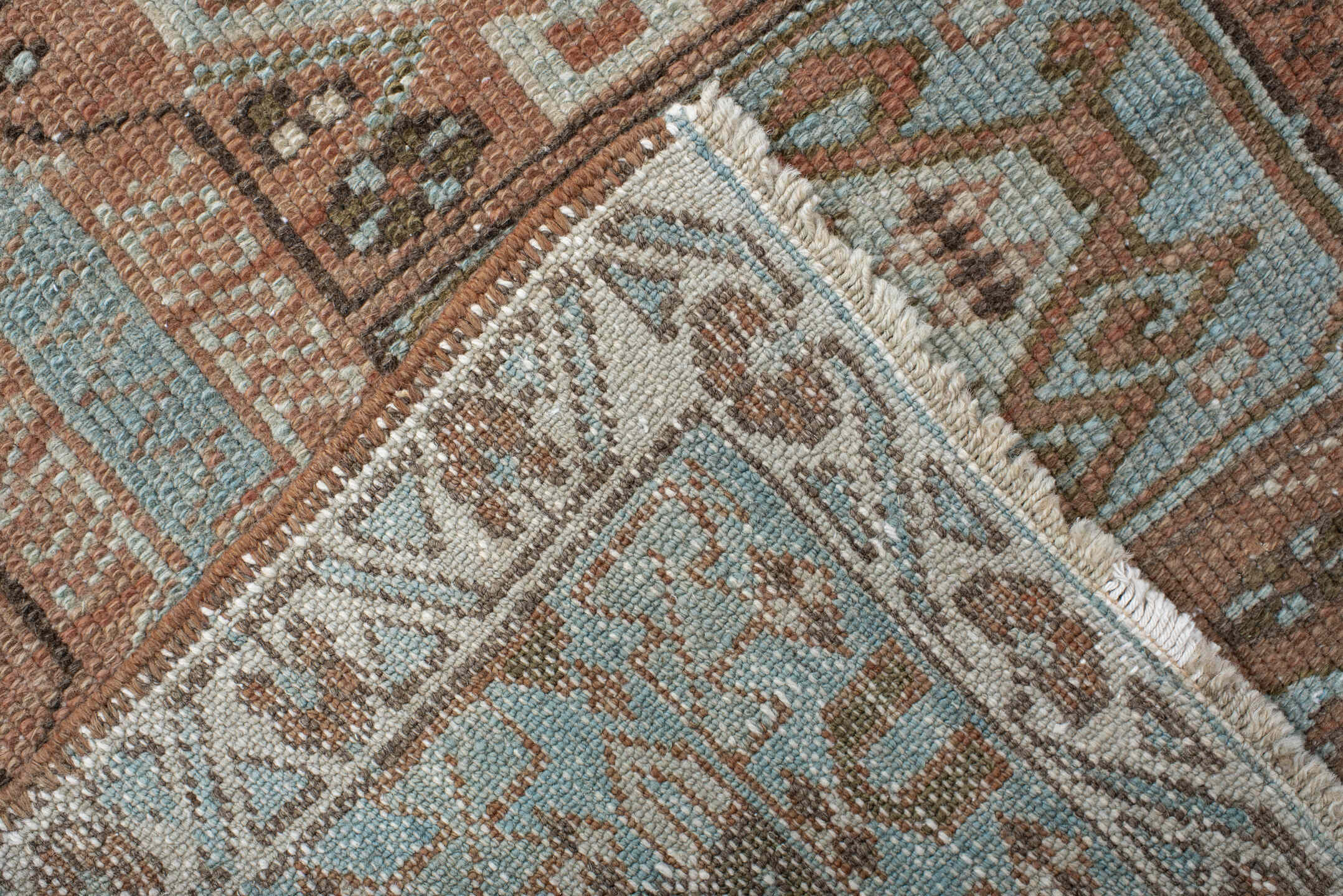 3' x 9' one-of-a-kind handmade antique Heriz runner rug. Color palette: terra cotta, sky blue, ivory, taupe, charcoal, sage