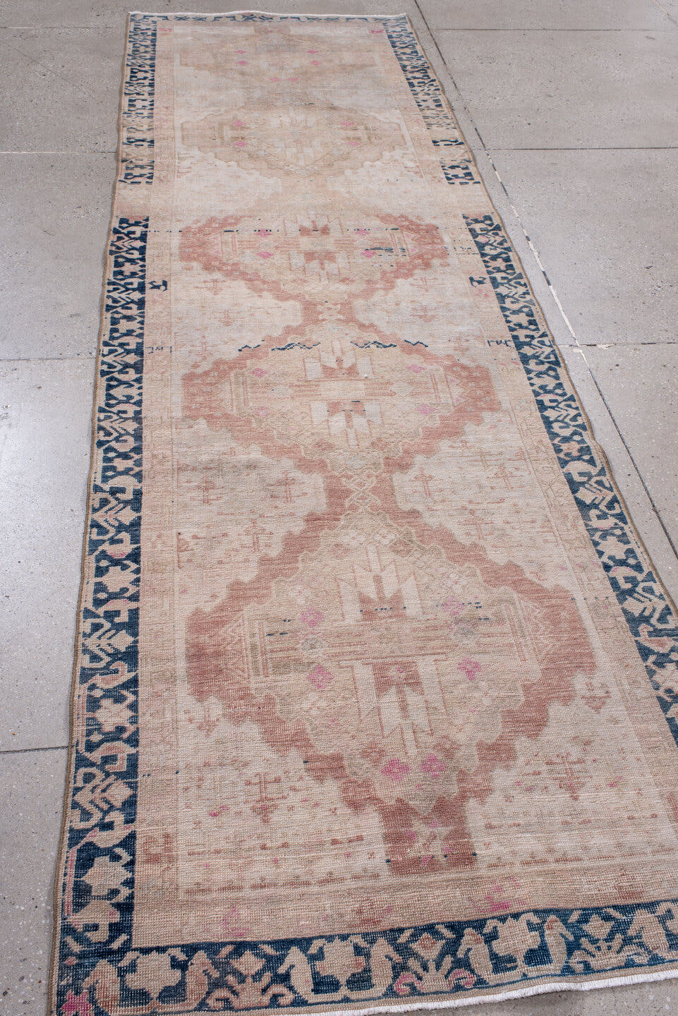 3' x 11' one-of-a-kind handmade antique Sarab runner rug. Color palette: blush, ivory, indigo, dusty rose, taupe, navy, pink