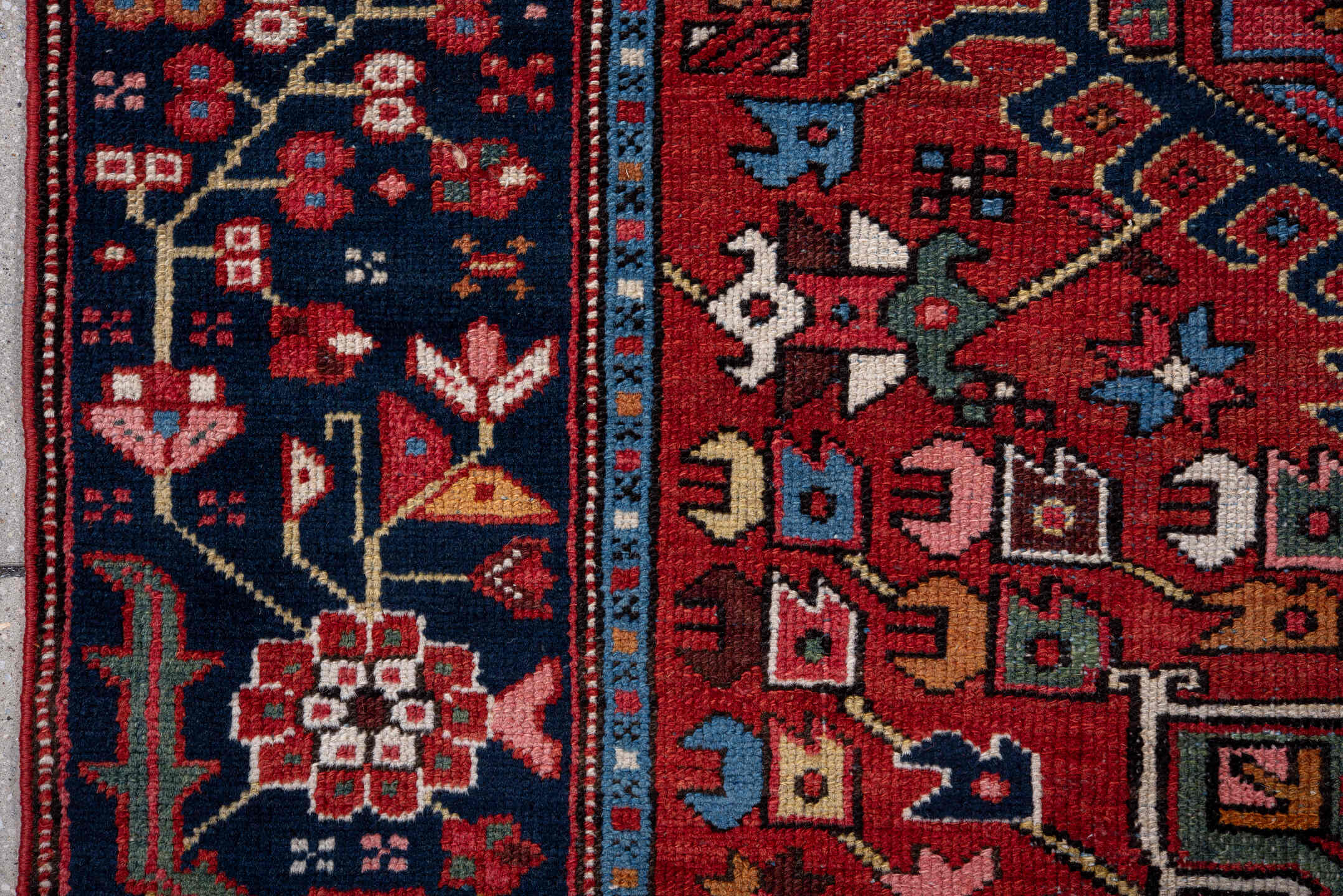 4' x 6' one-of-a-kind handmade vintage Karaje small size rug. Color palette: rust, navy, ivory, sky blue, sage, rose