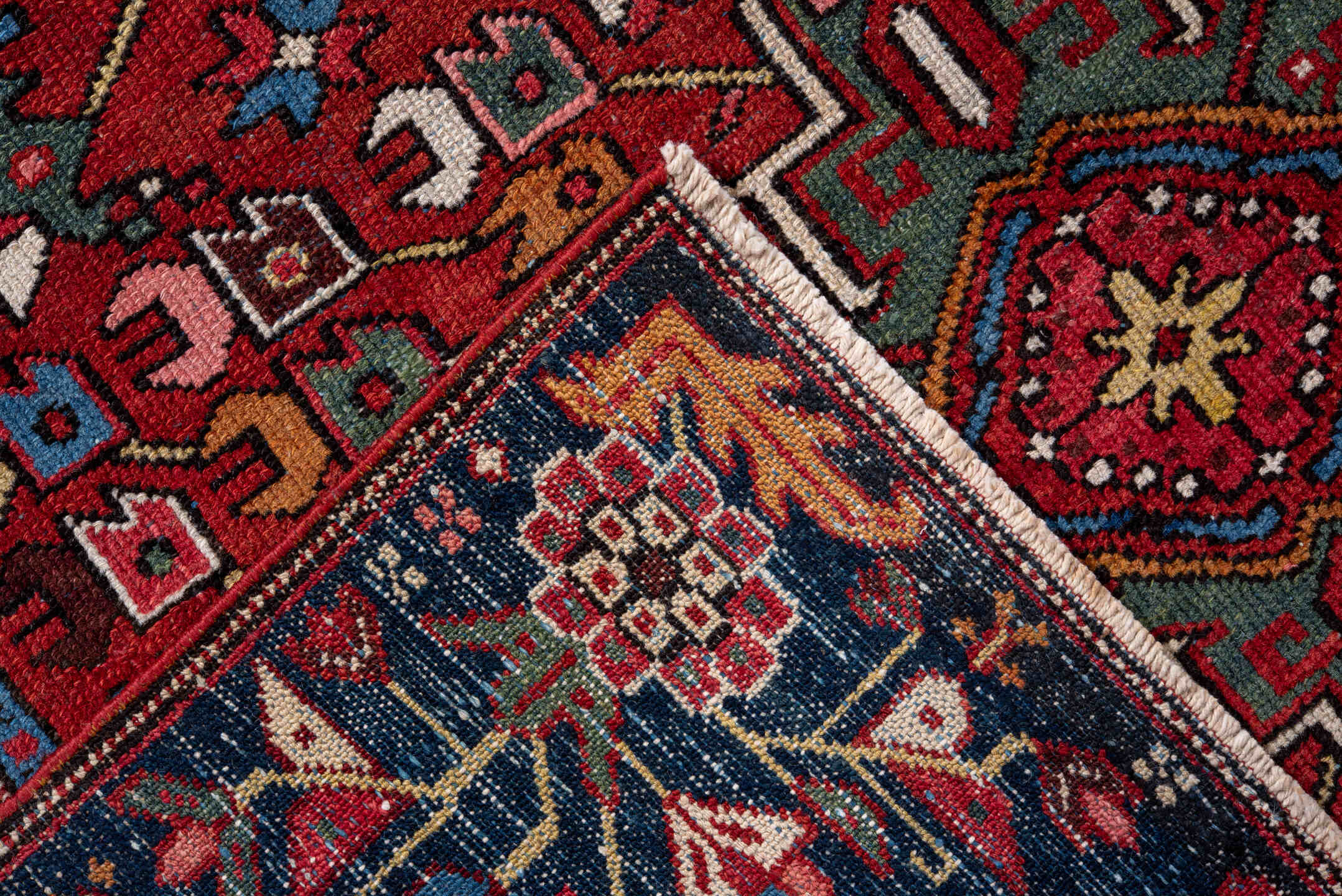 4' x 6' one-of-a-kind handmade vintage Karaje small size rug. Color palette: rust, navy, ivory, sky blue, sage, rose