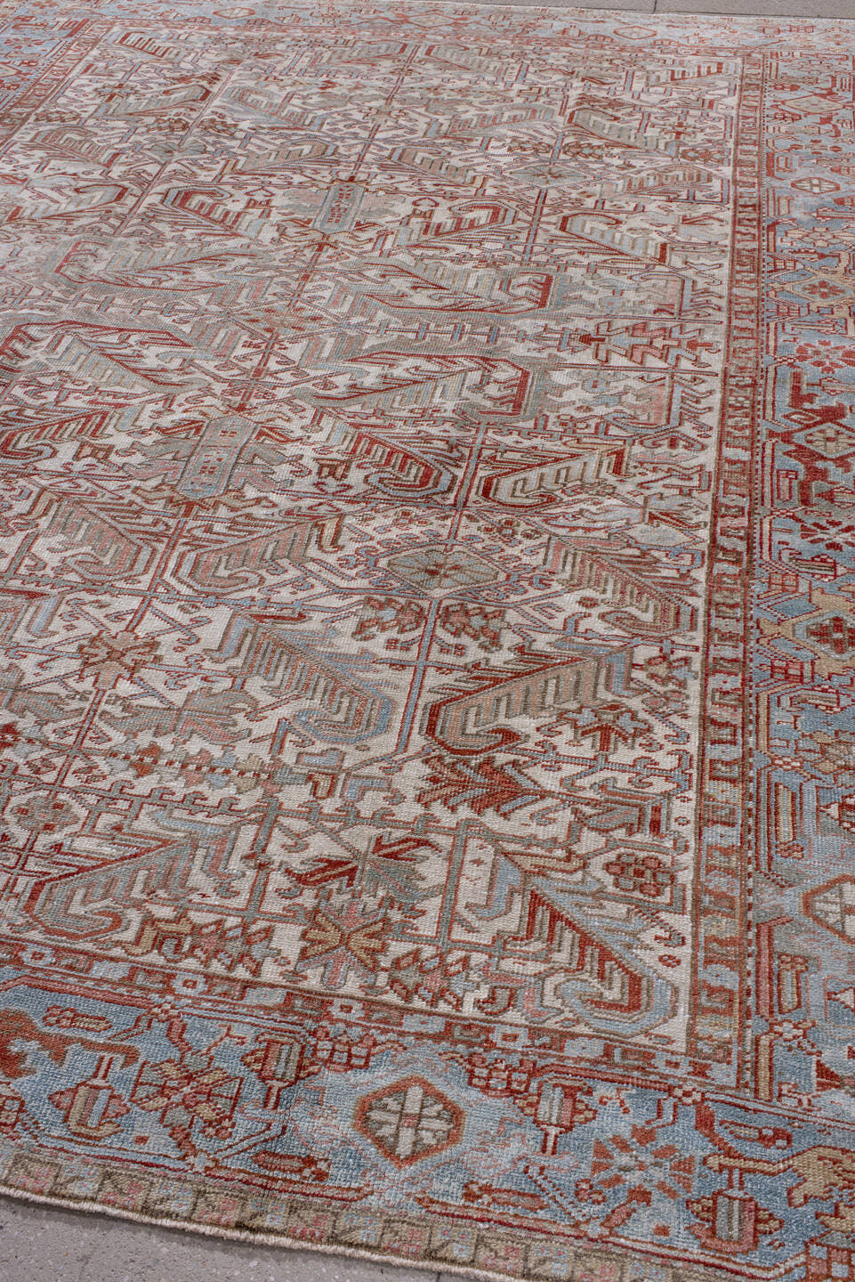 8' x 10' one-of-a-kind handmade antique Heriz large size rug. Color palette: pale blue, rust, ivory, taupe, camel