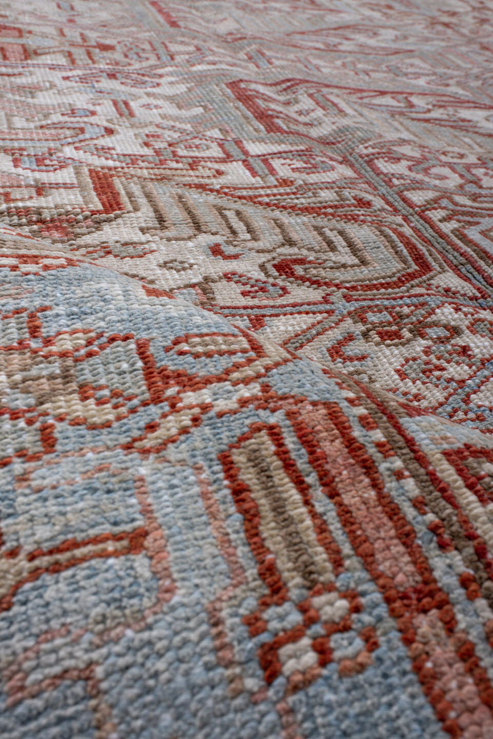 8' x 10' one-of-a-kind handmade antique Heriz large size rug. Color palette: pale blue, rust, ivory, taupe, camel