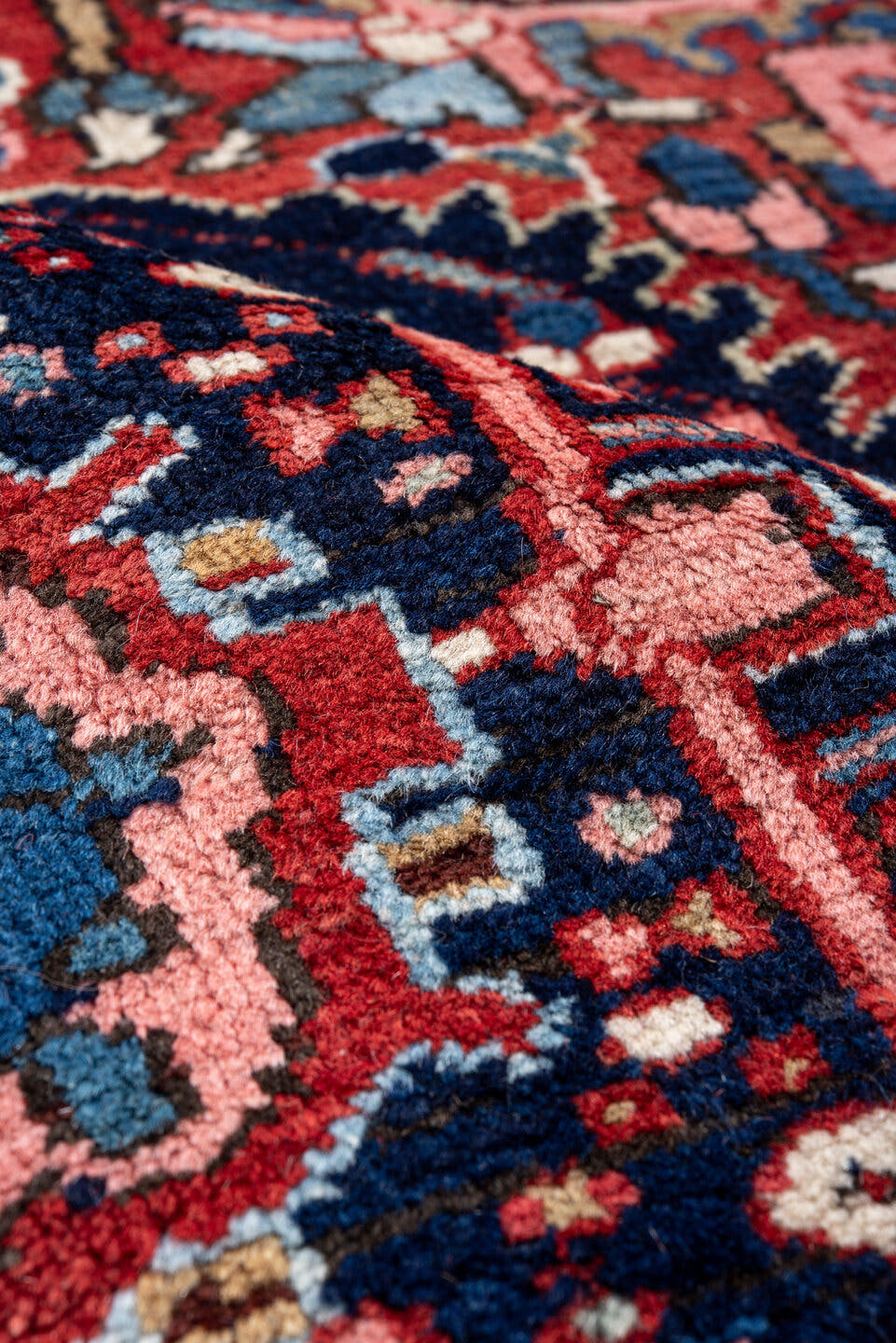 8' x 12' one-of-a-kind handmade vintage Heriz large size rug. Color palette: red, navy, ivory, sky blue, crimson, charcoal