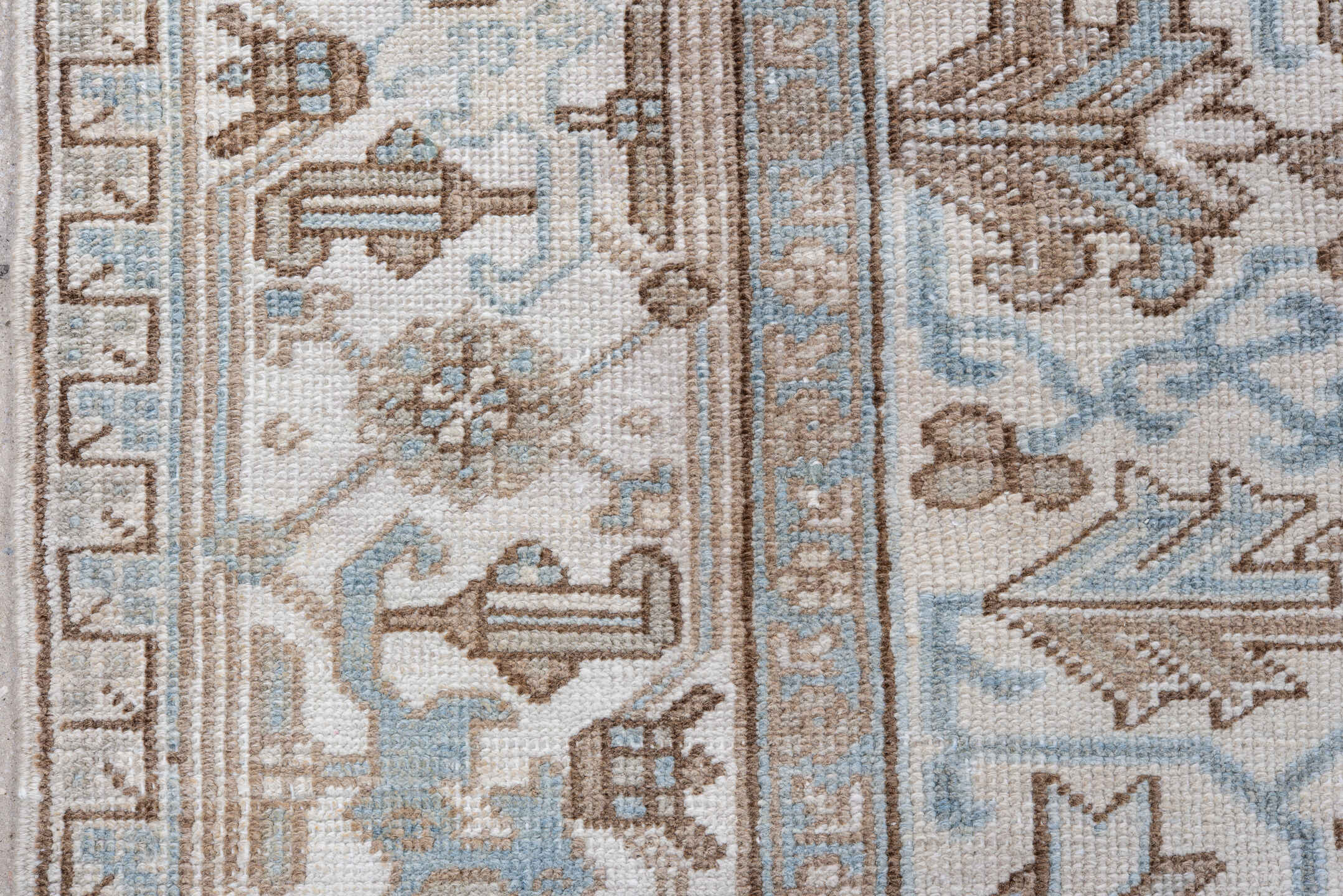 8' x 9' one-of-a-kind handmade antique Heriz rug. Color palette: ivory, pale blue, taupe, beige, light brown, light blue