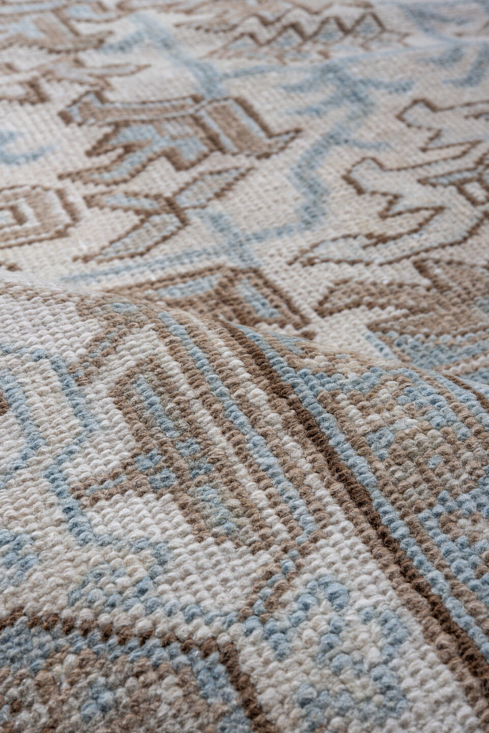 8' x 9' one-of-a-kind handmade antique Heriz rug. Color palette: ivory, pale blue, taupe, beige, light brown, light blue