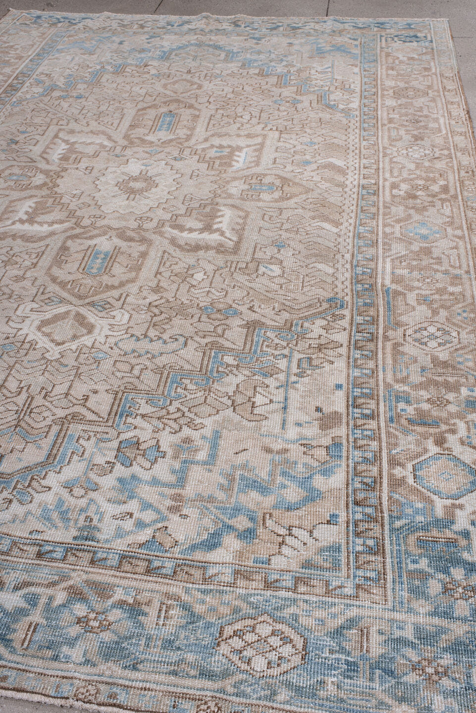 7' x 11' one-of-a-kind handmade antique Heriz large size rug. Color palette: taupe, ivory, powder blue, beige, camel