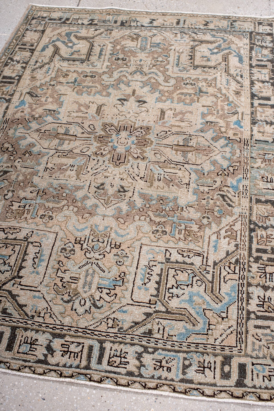 4' x 5' one-of-a-kind handmade antique Heriz small size rug. Color palette: ivory, taupe, camel, charcoal, sky blue, beige