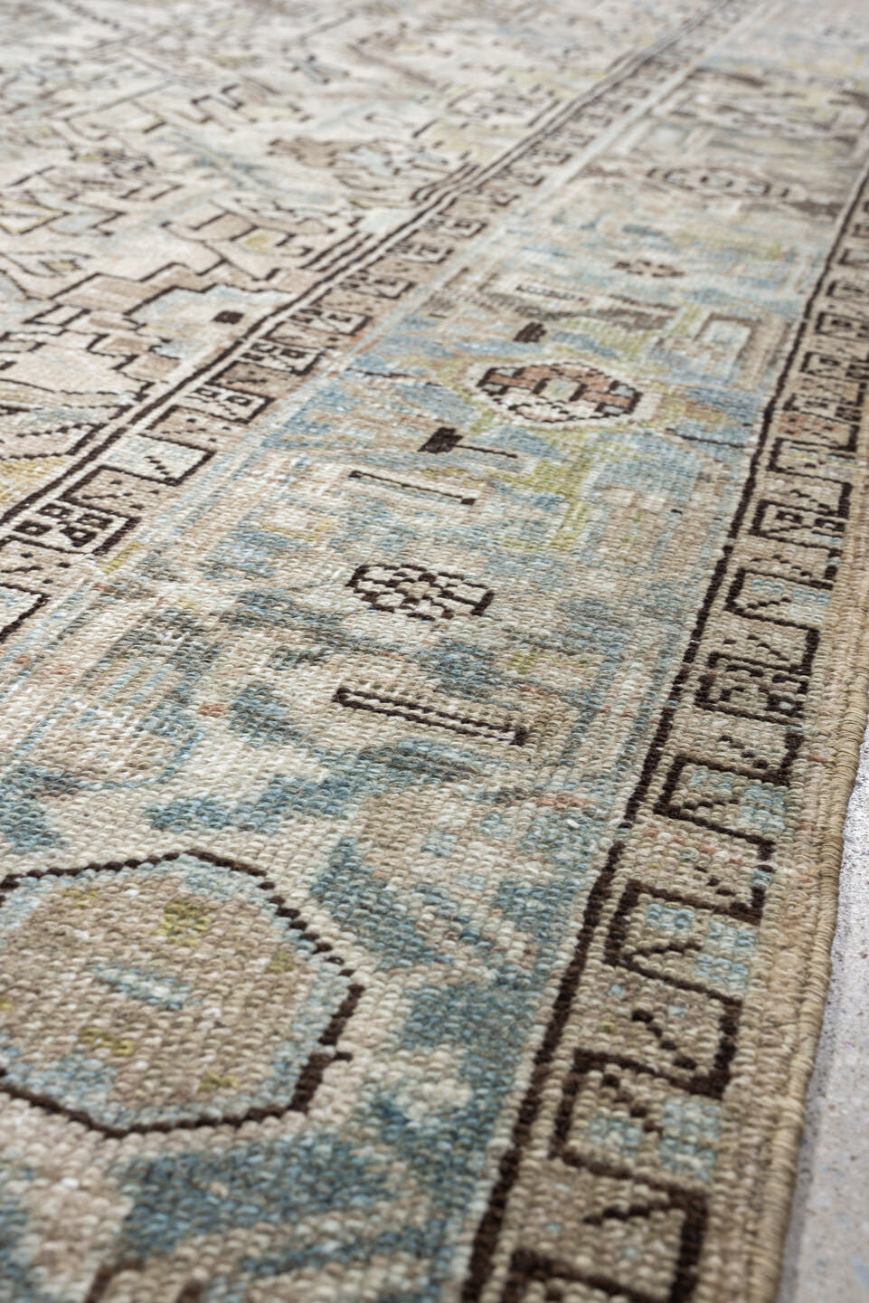 7' x 10' one-of-a-kind handmade vintage Heriz large size rug. Color palette: ivory, sky blue, taupe, charcoal, blush