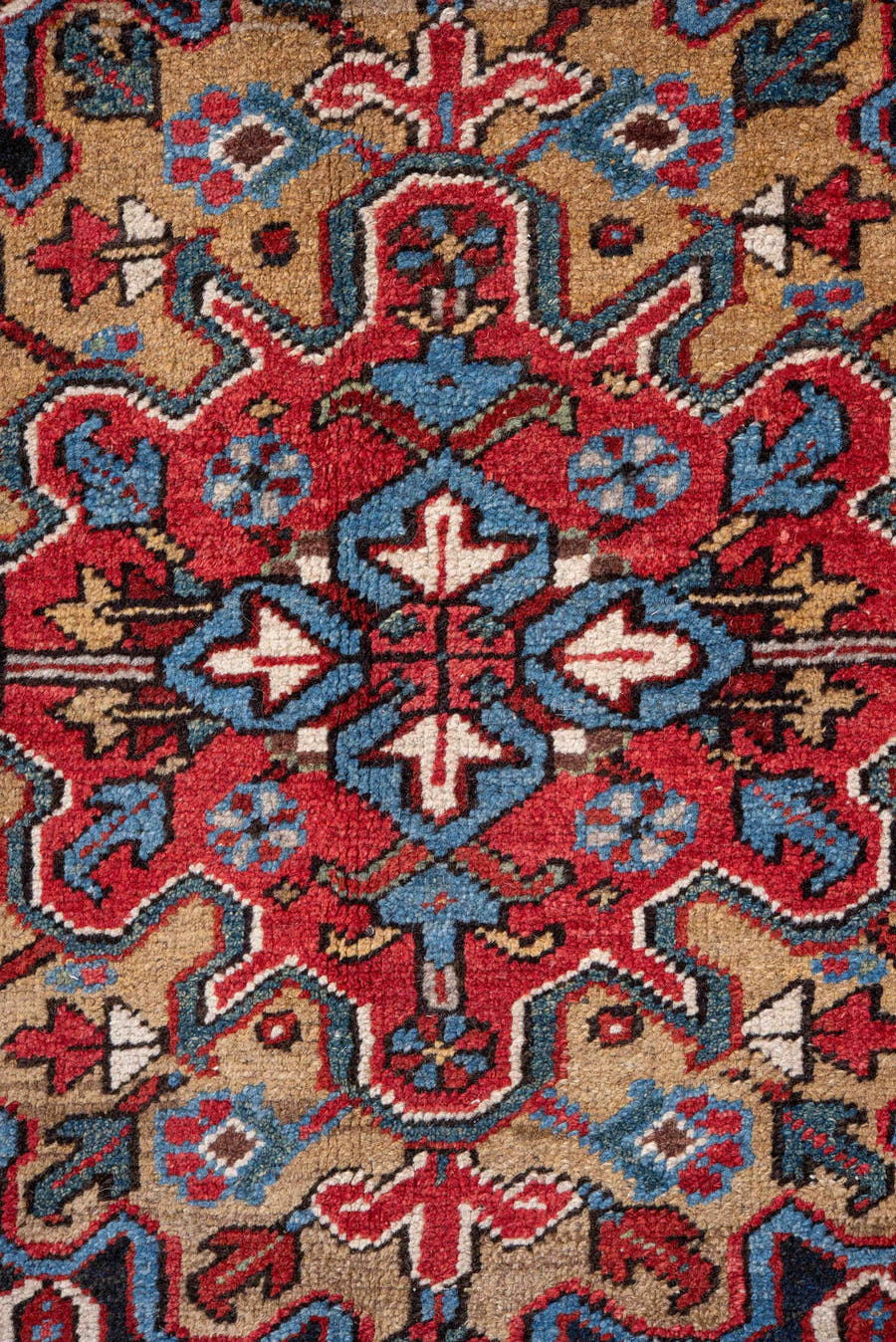 7' x 10' one-of-a-kind handmade vintage Heriz large size rug. Color palette: rust, navy, ivory, sky blue, camel, crimson