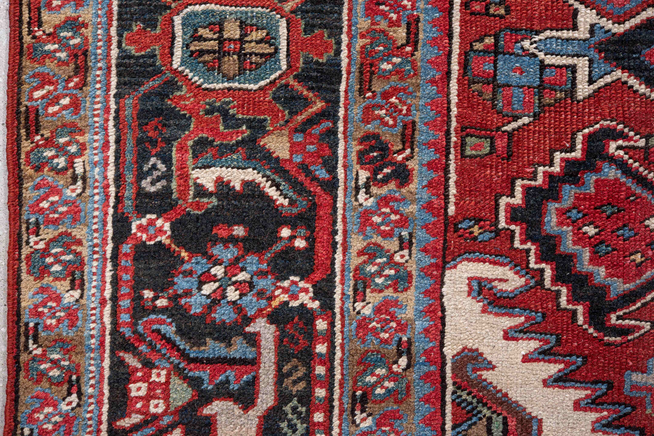 7' x 10' one-of-a-kind handmade vintage Heriz large size rug. Color palette: rust, navy, ivory, sky blue, camel, crimson