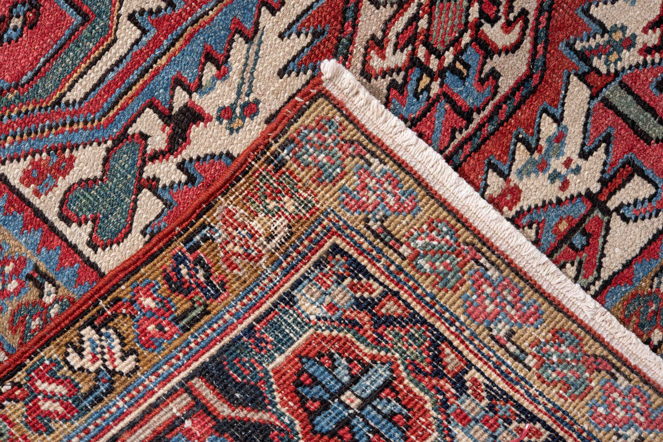 7' x 10' one-of-a-kind handmade vintage Heriz large size rug. Color palette: rust, navy, ivory, sky blue, camel, crimson