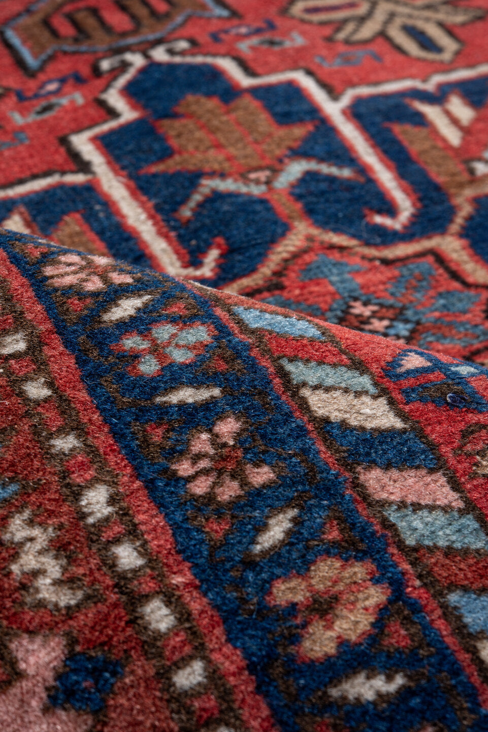 3' x 4' one-of-a-kind handmade vintage Heriz small size rug. Color palette: rust, navy, sky_blue, camel, ivory, rose, brown