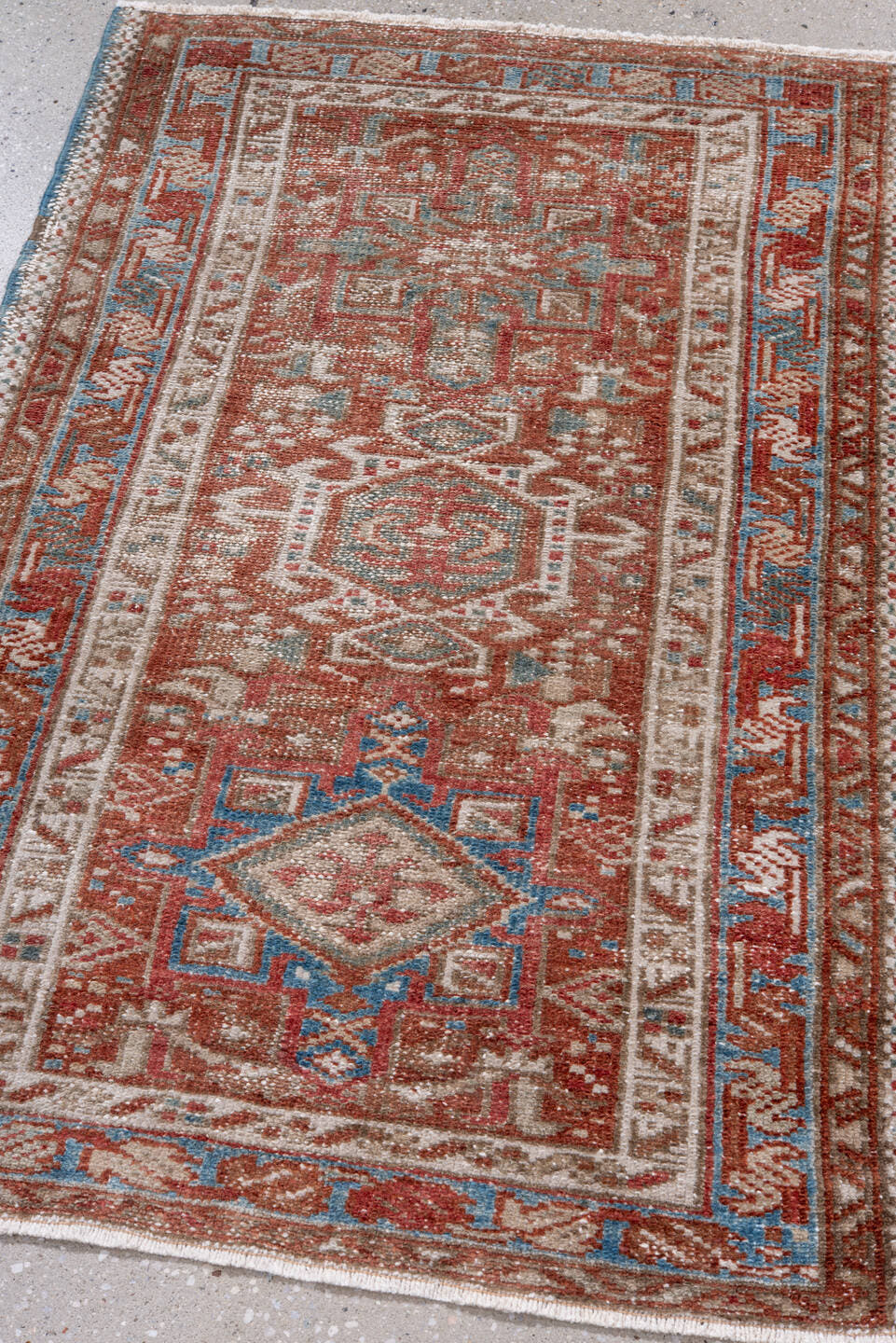 2' x 3' one-of-a-kind handmade antique Karaje small size rug. Color palette: rust, ivory, sky blue, taupe, brown, terracotta