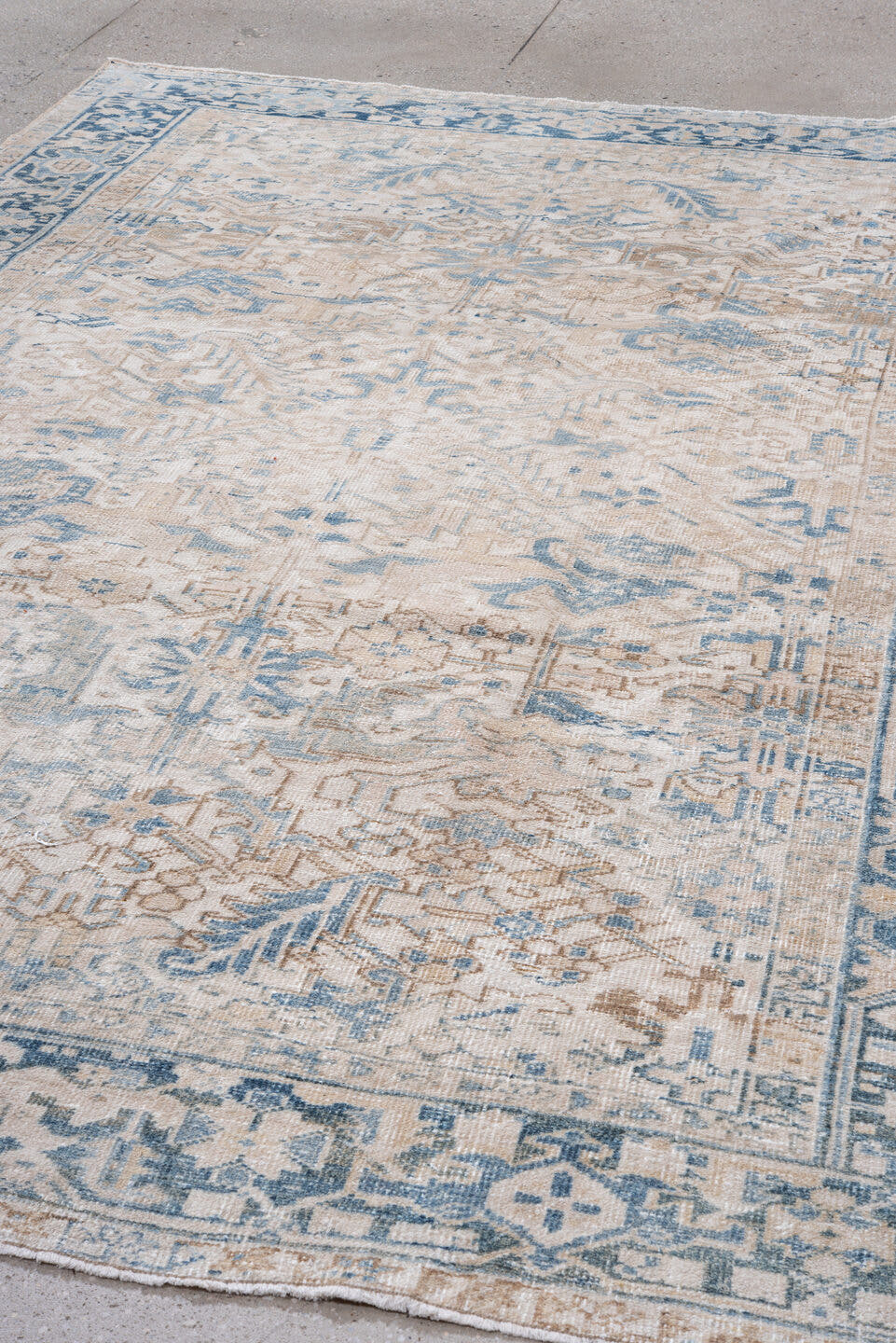 7' x 10' one-of-a-kind handmade vintage Heriz large size rug. Color palette: ivory, sky blue, beige, taupe, camel