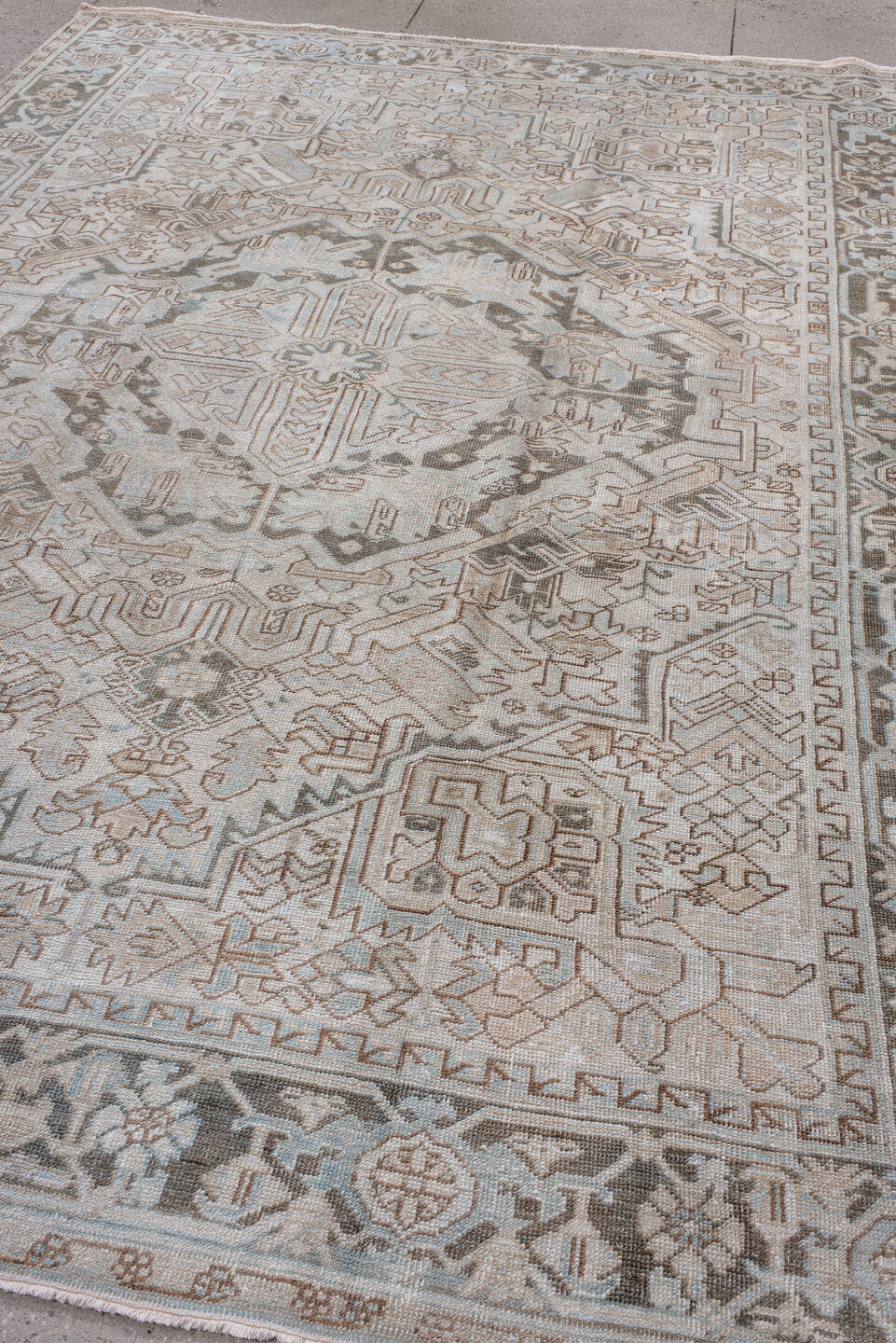 8' x 11' one-of-a-kind handmade antique Heriz large size rug. Color palette: ivory, taupe, gray, pale blue, beige, camel