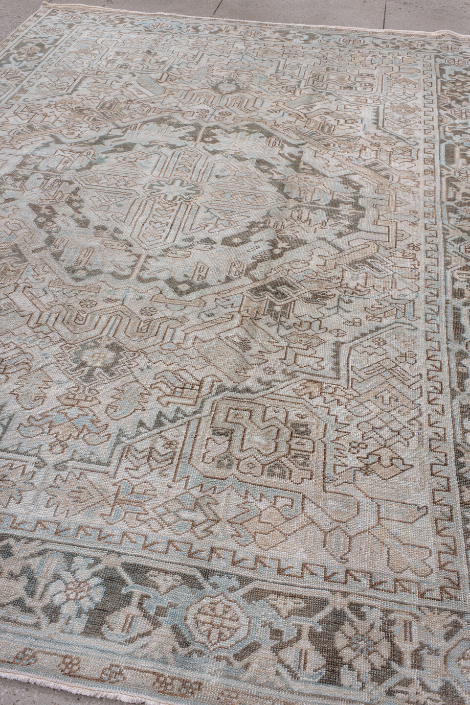 8' x 11' one-of-a-kind handmade antique Heriz large size rug. Color palette: ivory, taupe, gray, pale blue, beige, camel