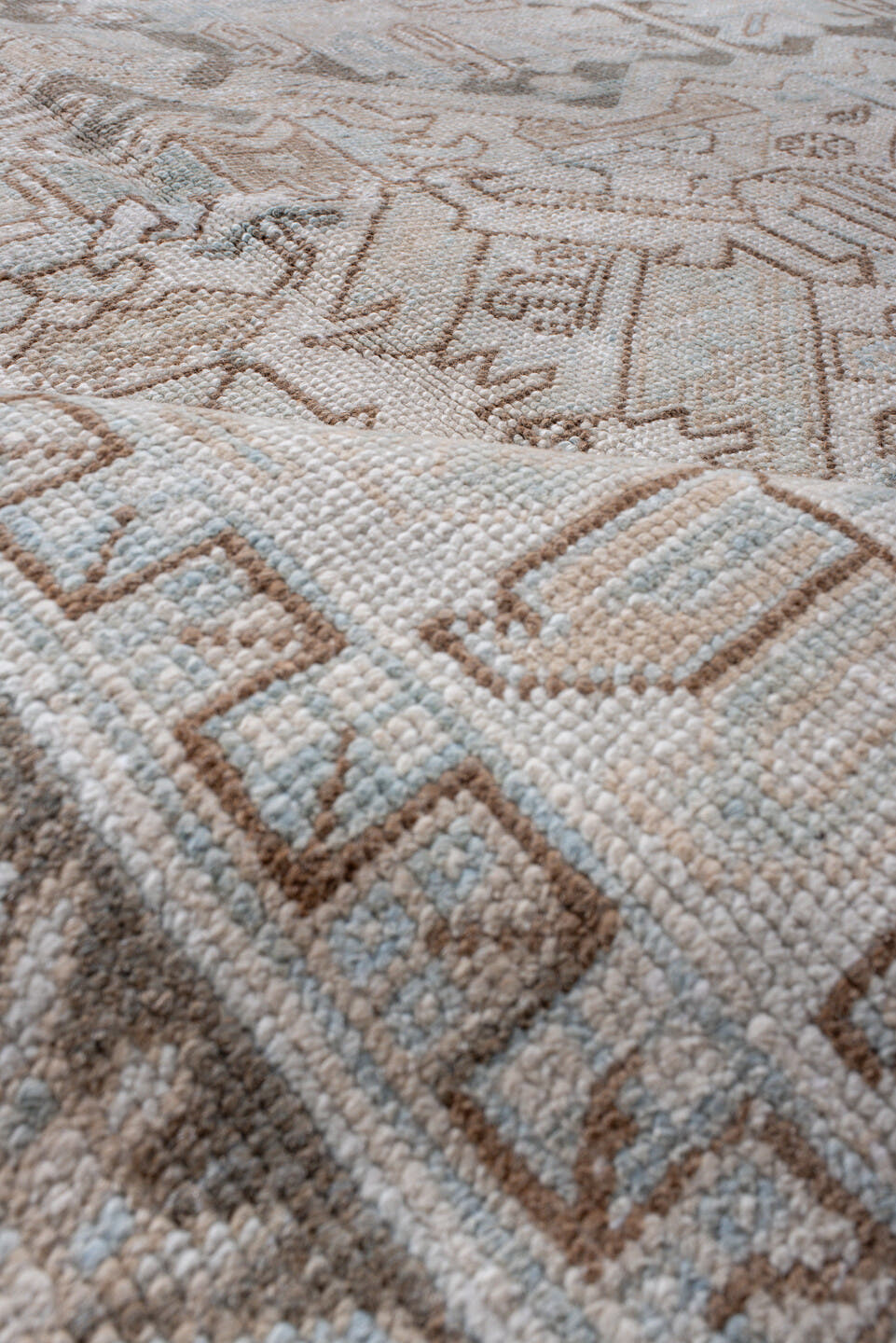 8' x 11' one-of-a-kind handmade antique Heriz large size rug. Color palette: ivory, taupe, gray, pale blue, beige, camel