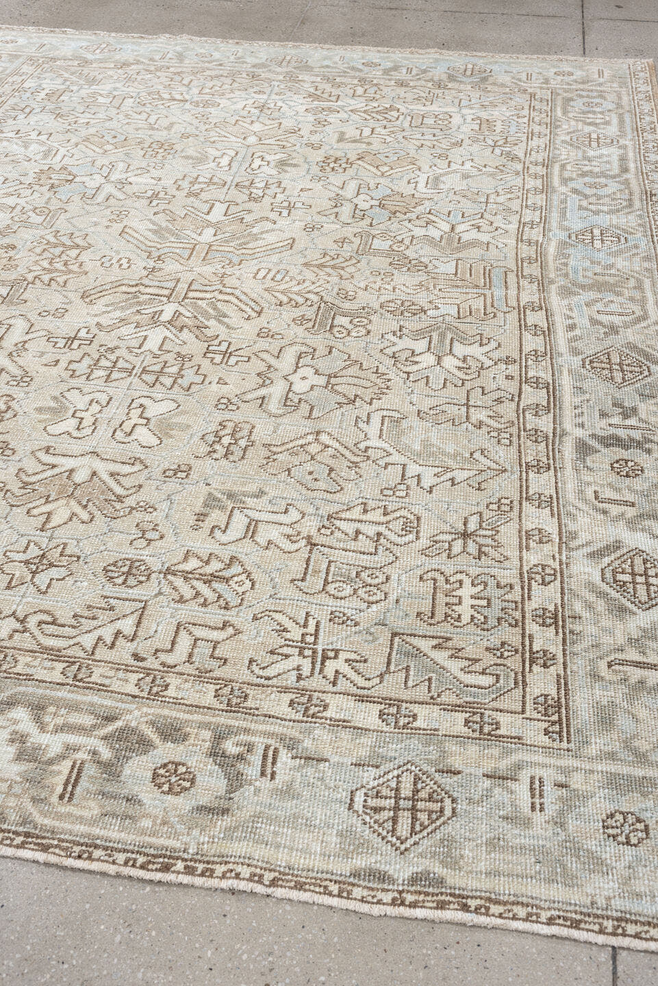 7' x 8' one-of-a-kind handmade vintage Heriz rug. Color palette: ivory, pale blue, taupe, beige, light gray, camel