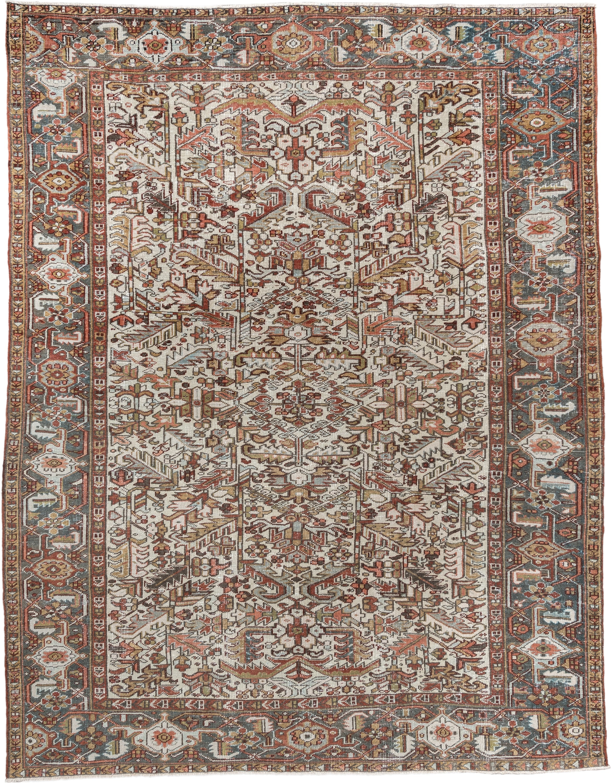 7' x 9' one-of-a-kind handmade vintage Heriz rug. Color palette: ivory, blue gray, rust, camel, sage, terracotta, taupe