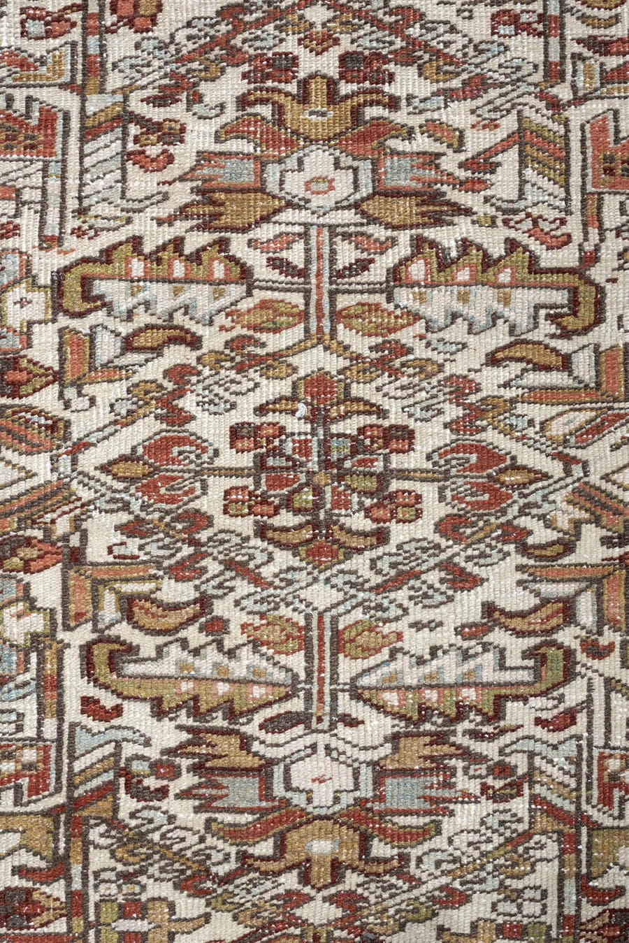 7' x 9' one-of-a-kind handmade vintage Heriz rug. Color palette: ivory, blue gray, rust, camel, sage, terracotta, taupe