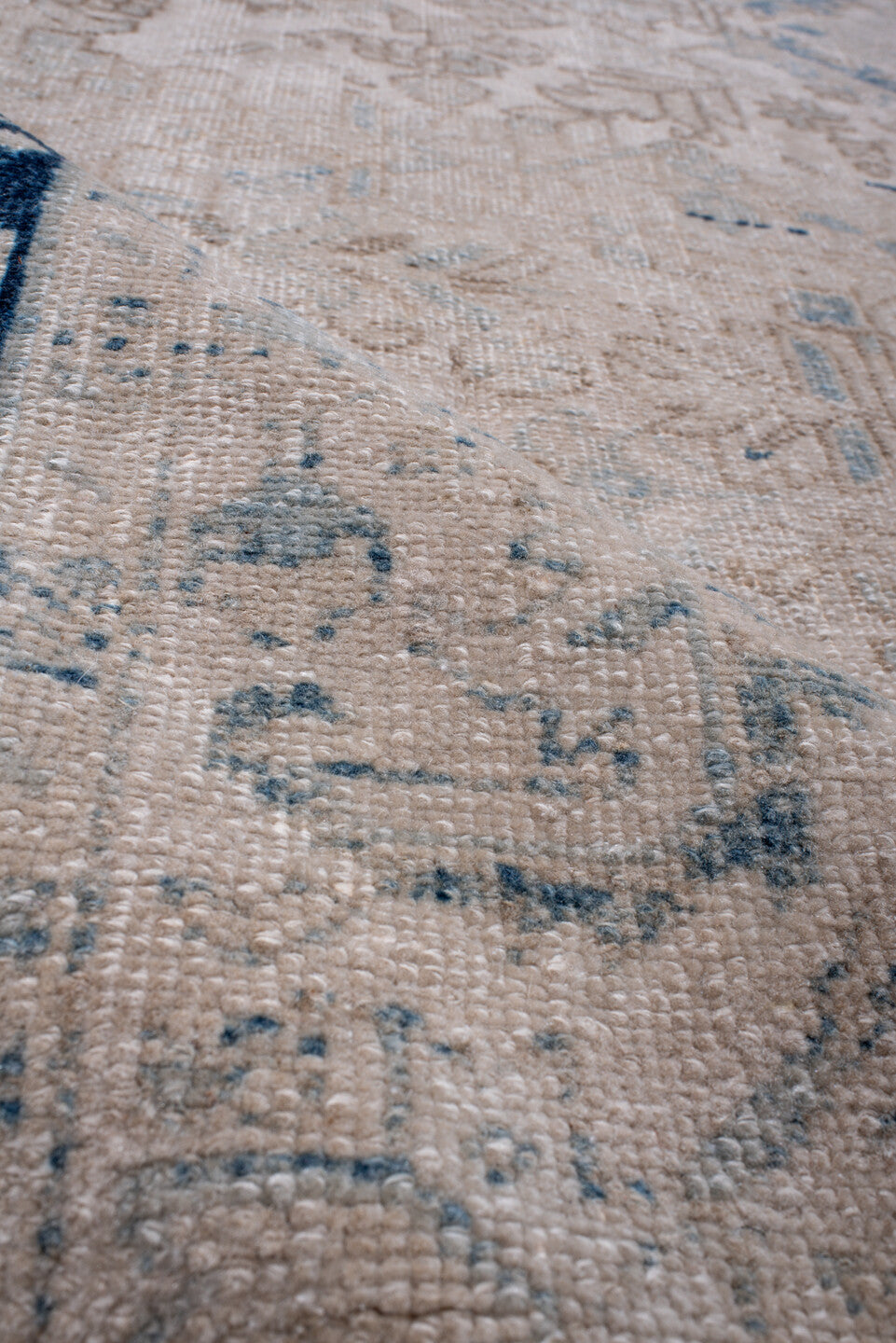 7' x 10' one-of-a-kind handmade antique Heriz large size rug. Color palette: ivory, navy, taupe, slate, beige, powder_blue