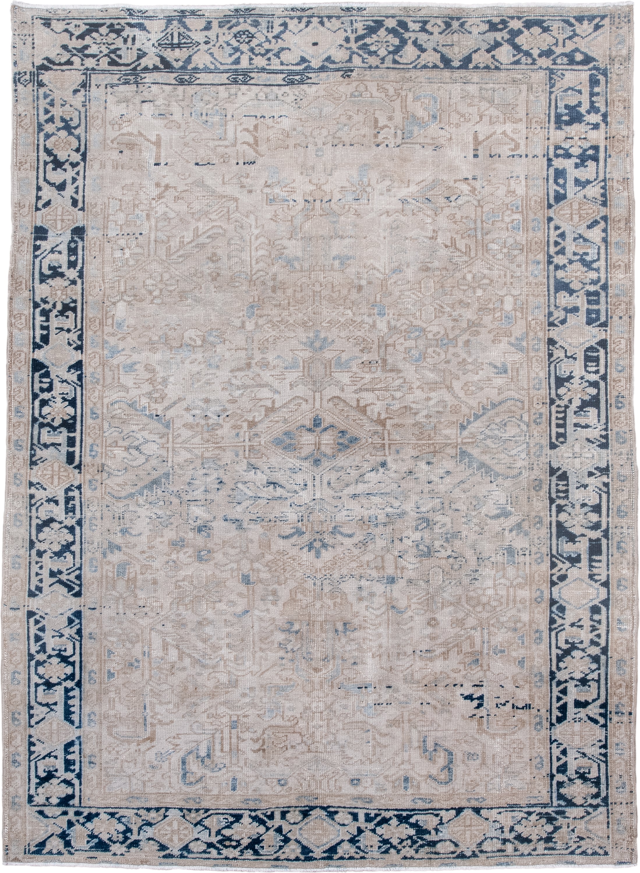 6' x 8' one-of-a-kind handmade antique Heriz medium size rug. Color palette: ivory, indigo, beige, light blue, taupe, purple