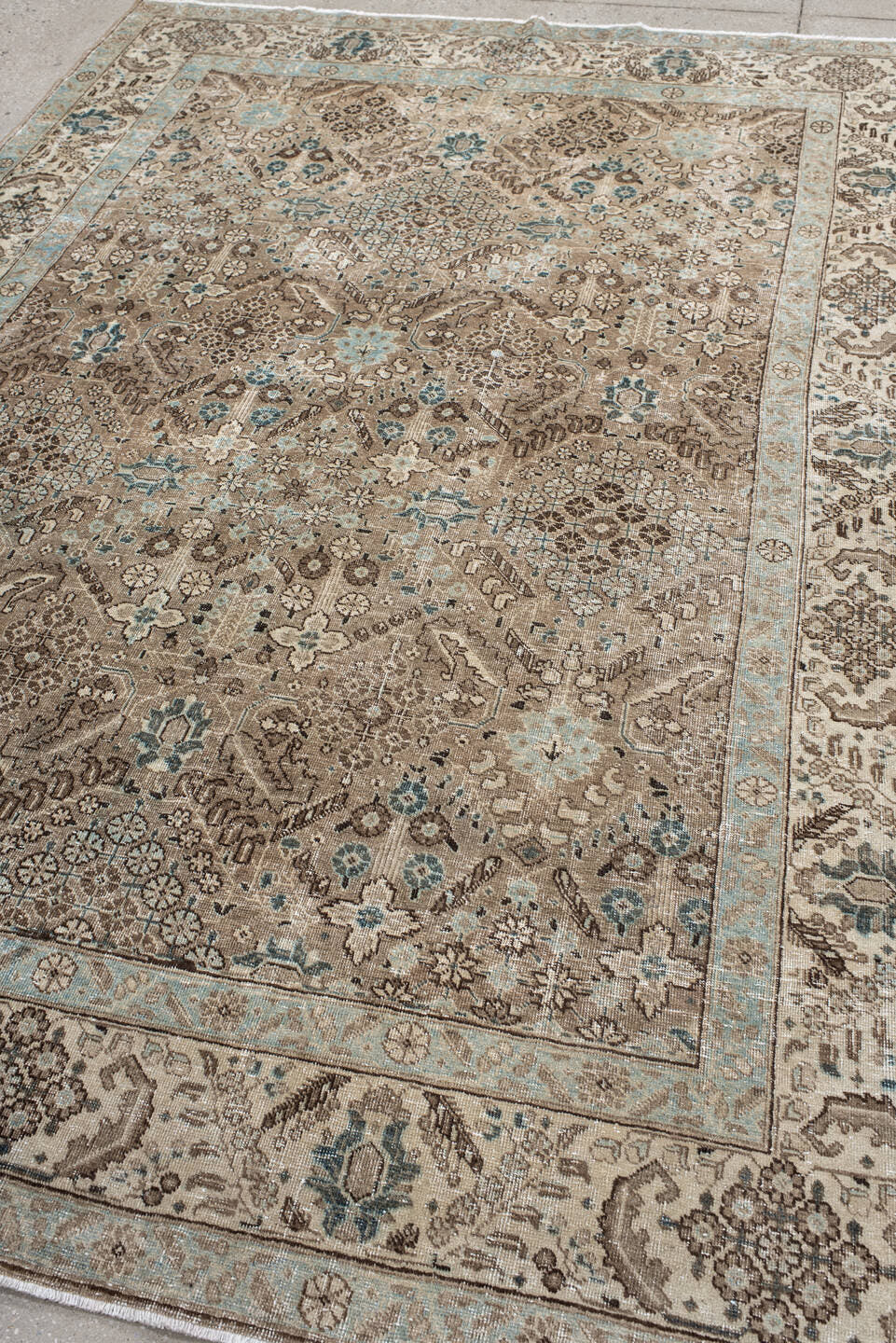 6' x 9' one-of-a-kind handmade antique Tabriz medium size rug. Color palette: taupe, ivory, pale blue, brown, beige, slate