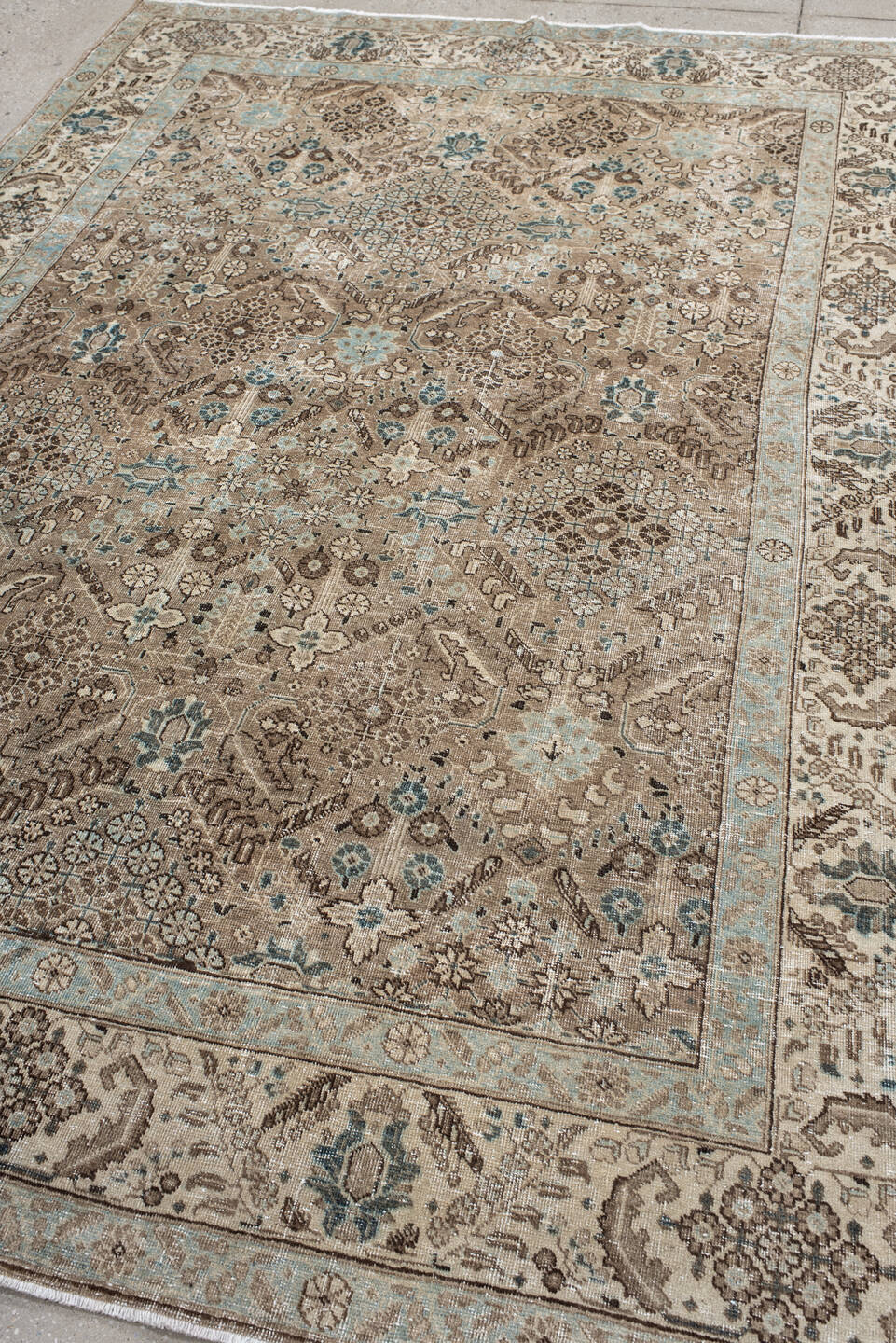 6' x 9' one-of-a-kind handmade antique Tabriz medium size rug. Color palette: taupe, ivory, pale blue, brown, beige, slate