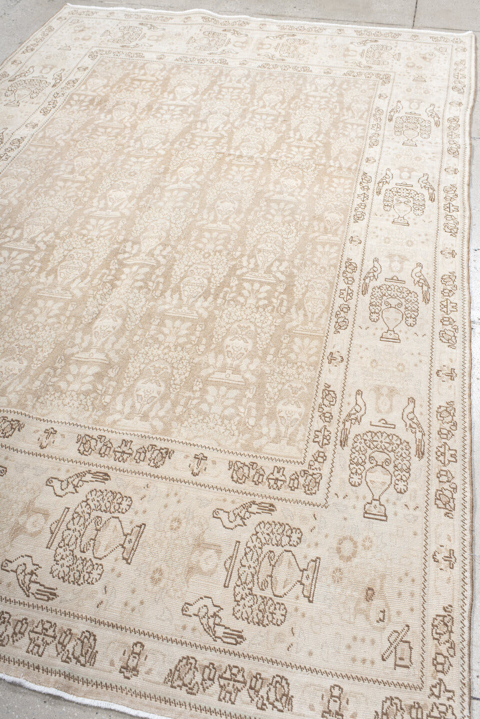 6' x 9' one-of-a-kind handmade antique Tabriz medium size rug. Color palette: ivory, beige, taupe, camel, brown, gray