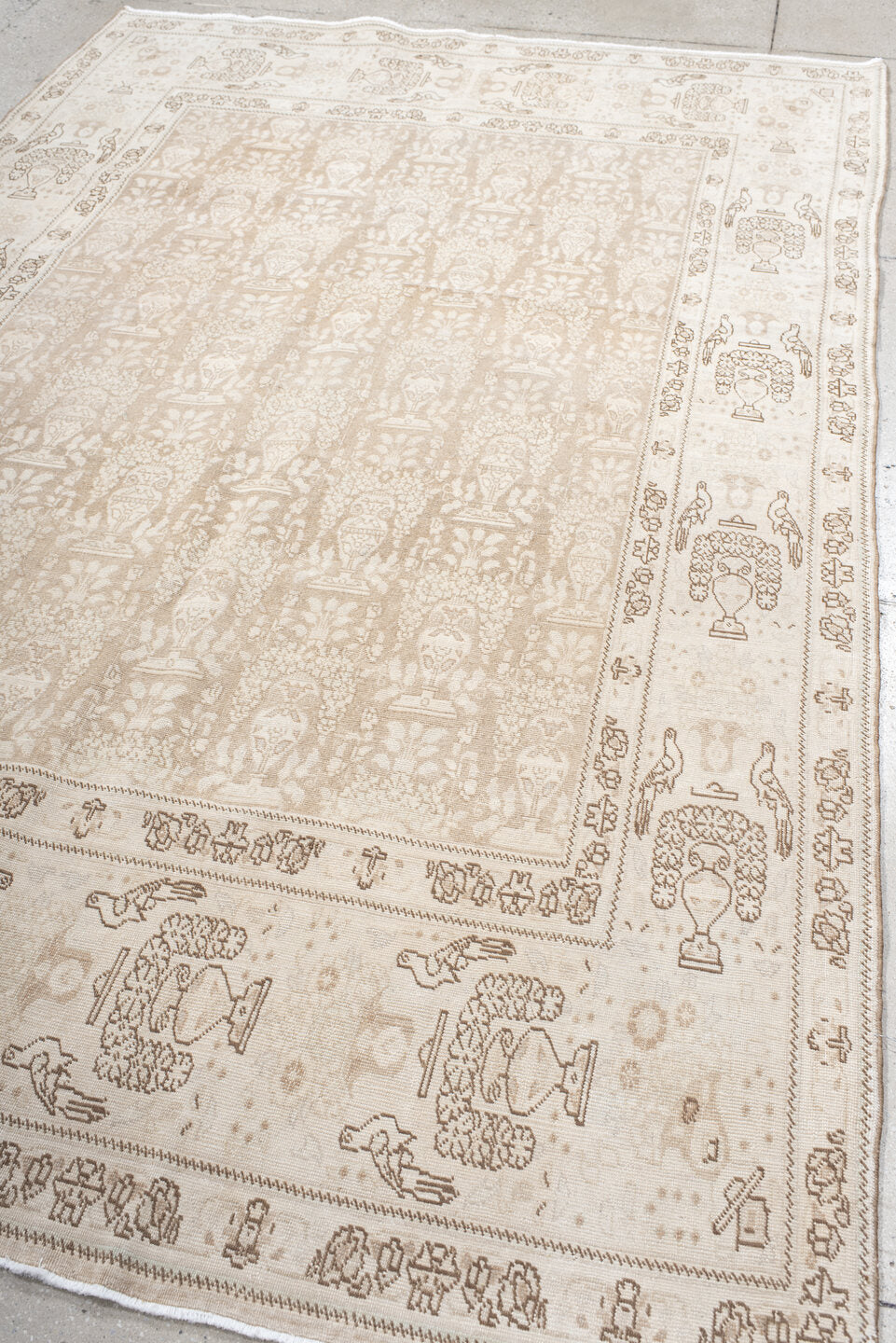 6' x 9' one-of-a-kind handmade antique Tabriz medium size rug. Color palette: ivory, beige, taupe, camel, brown, gray