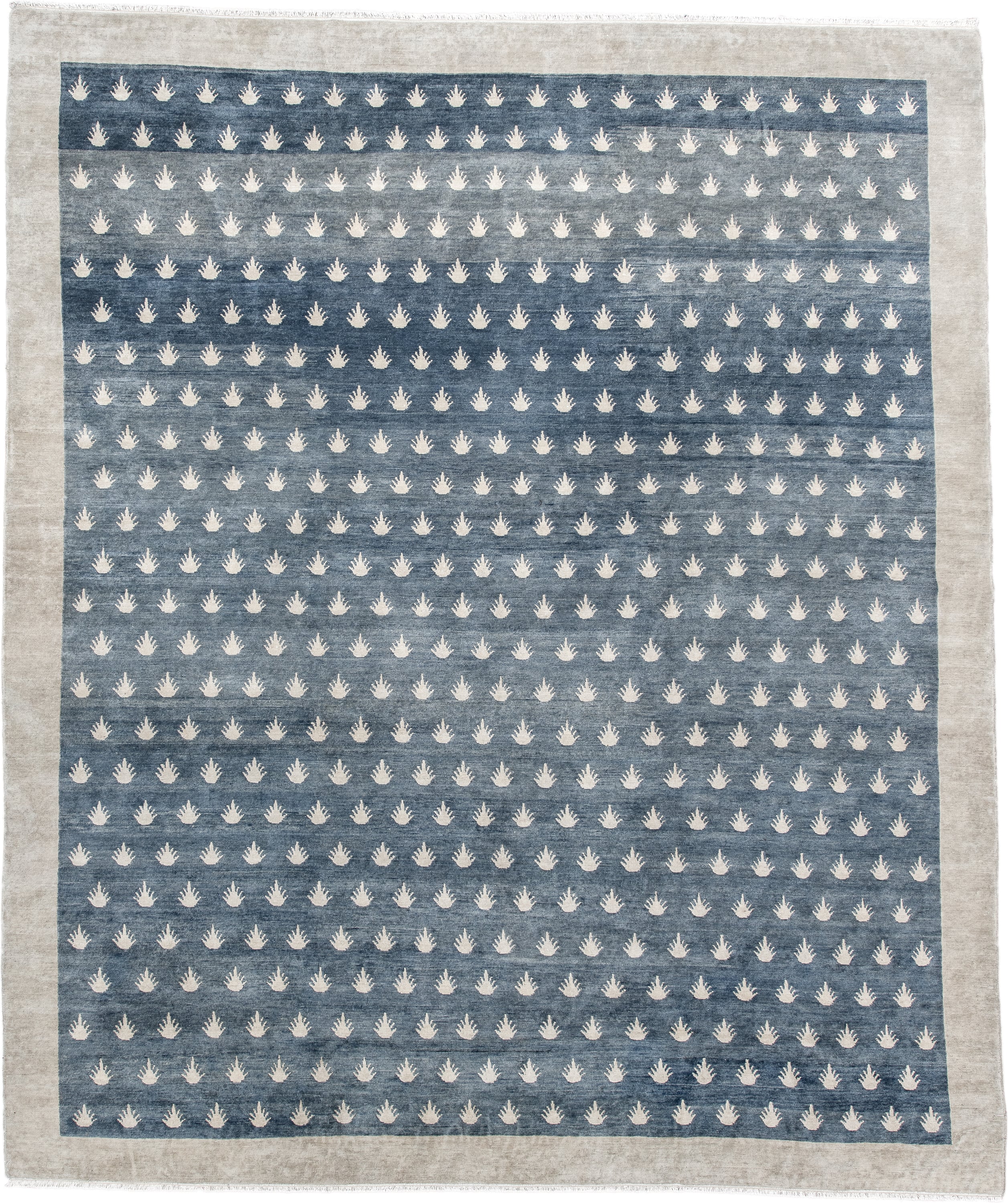 7' x 9' one-of-a-kind handmade vintage Tibetan rug. Color palette: blue, ivory, cream, taupe, gray, beige