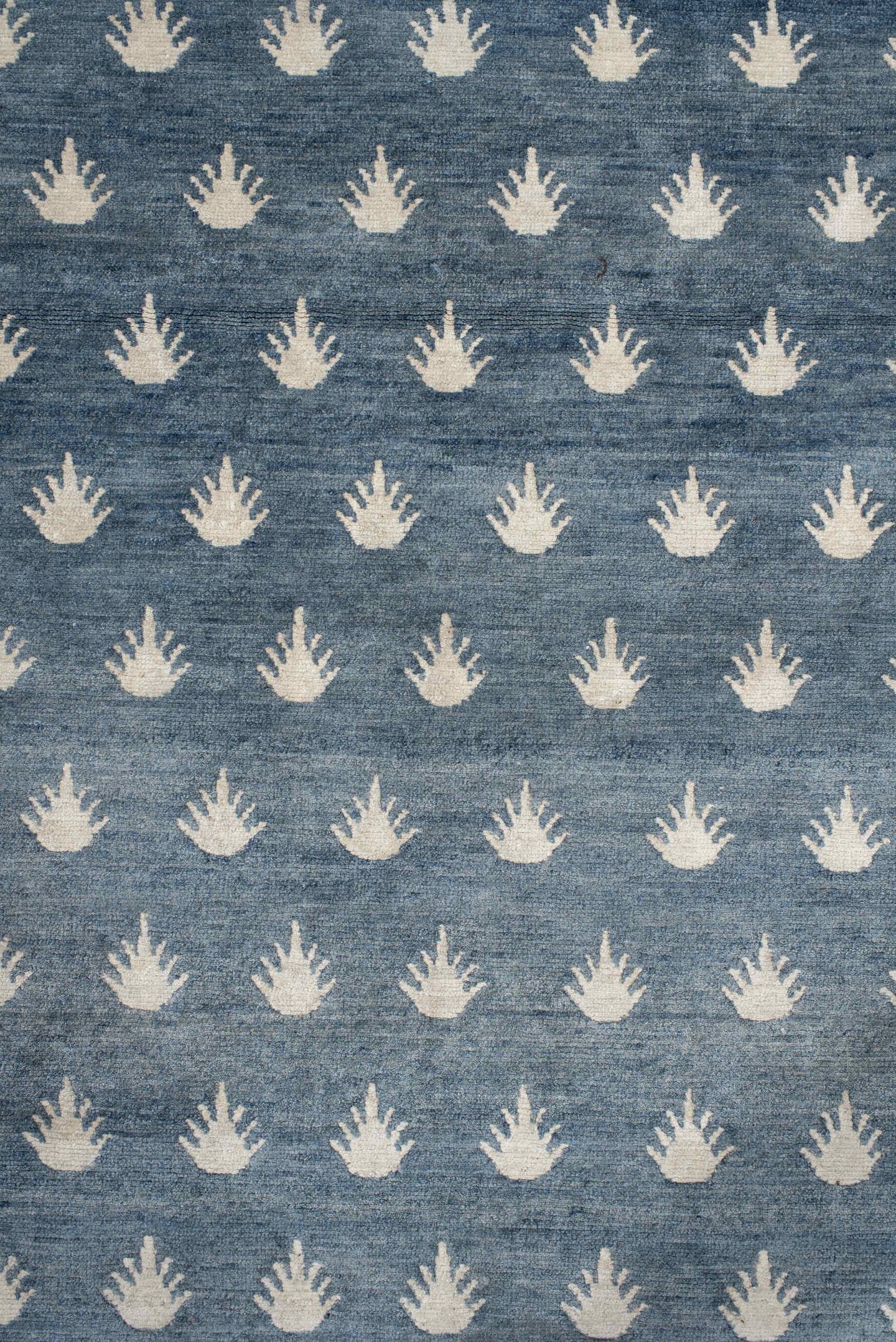 7' x 9' one-of-a-kind handmade vintage Tibetan rug. Color palette: blue, ivory, cream, taupe, gray, beige